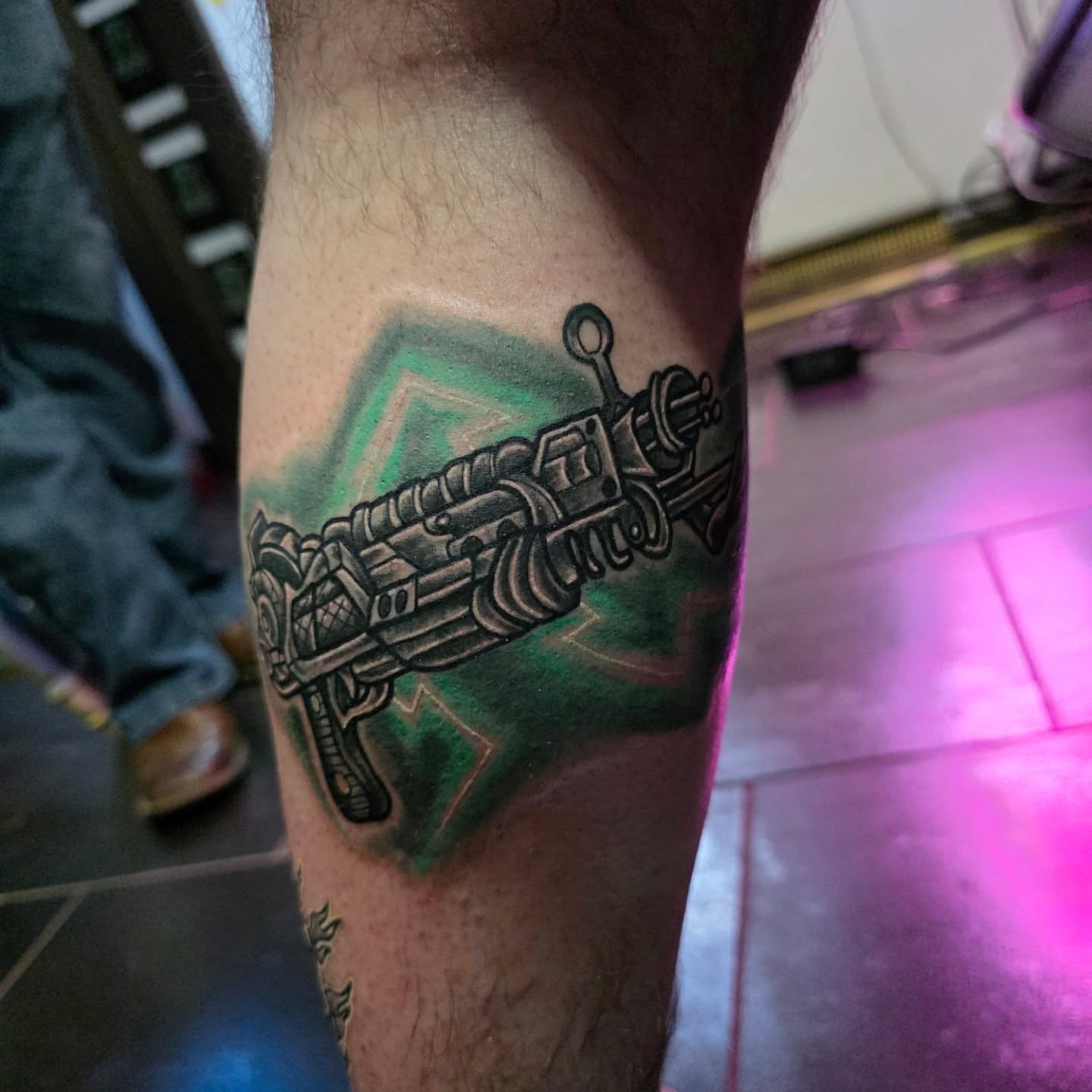 Gun geometric tattoo on the forearm by Michael Latendresse