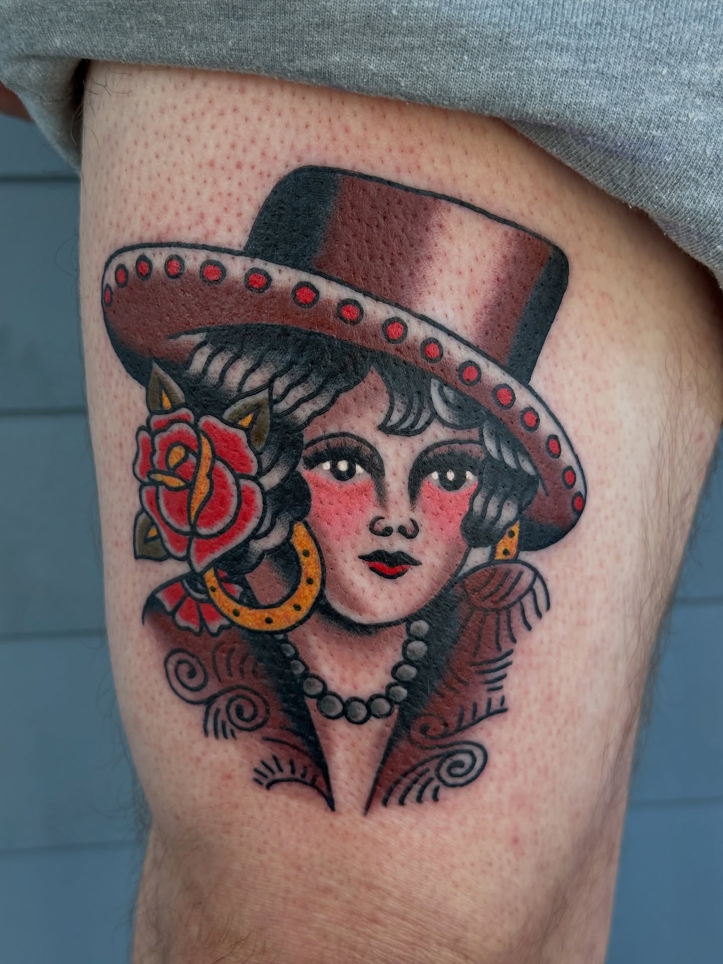 Flapper woman American traditional tattoo on the thigh by Michael Williams