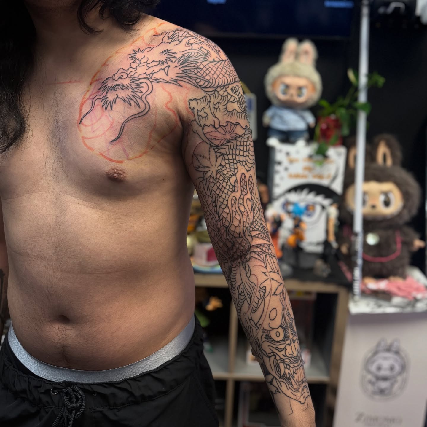 Dragon japanese irezumi tattoo on the upper arm by Zack Yang, Houston, Texas
