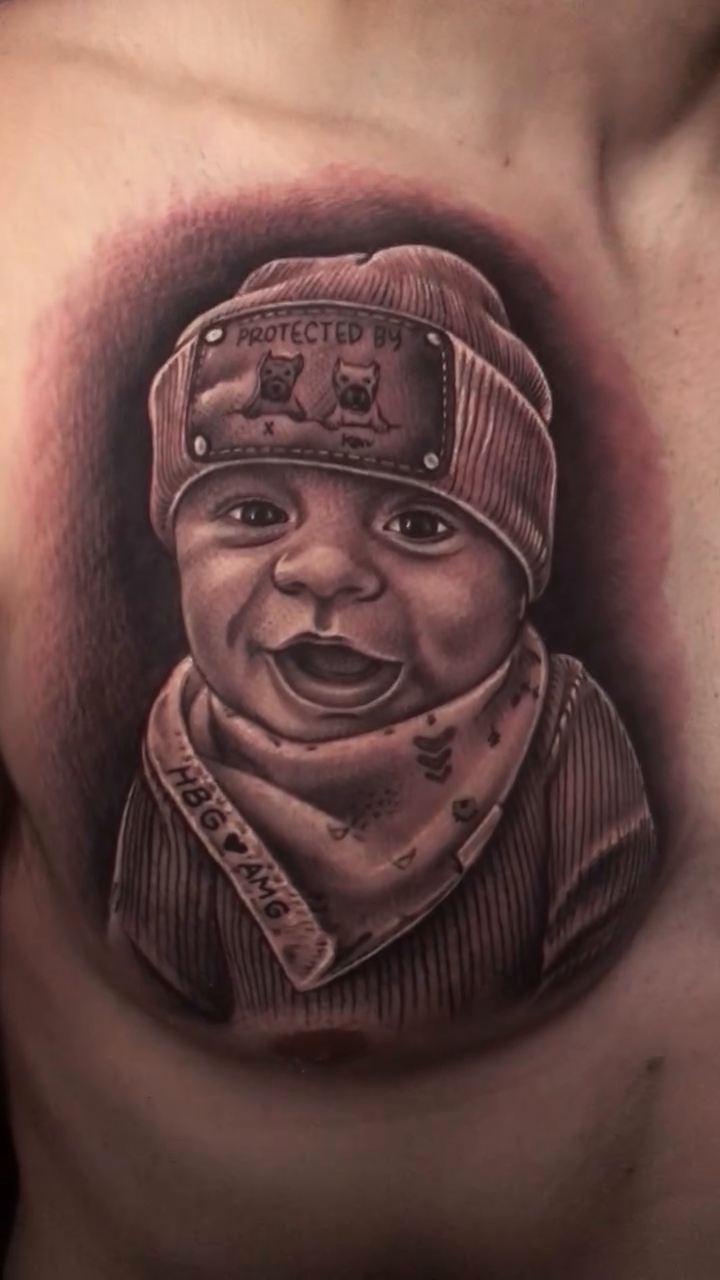 Baby portrait realism tattoo by Jose Calderon