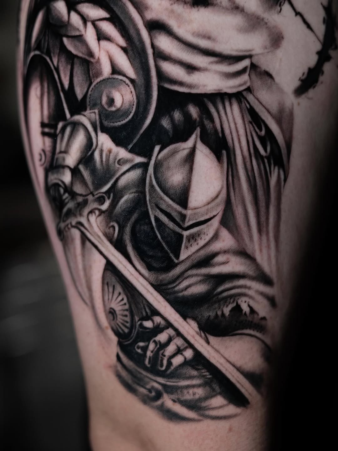 Armored warrior with sword realism tattoo on the forearm by Charlotte Tattoo Artist
