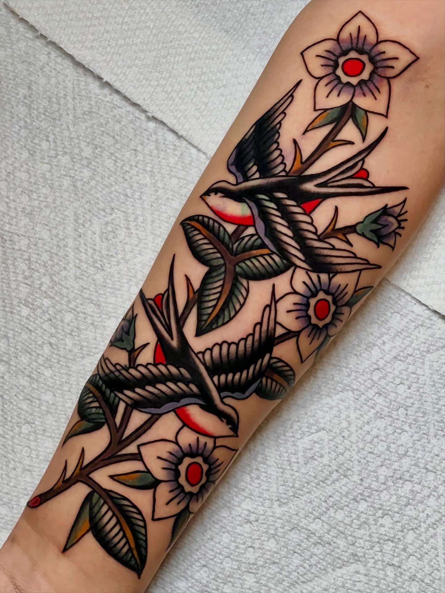 Birds and flowers American traditional tattoo on the forearm by Liv :)