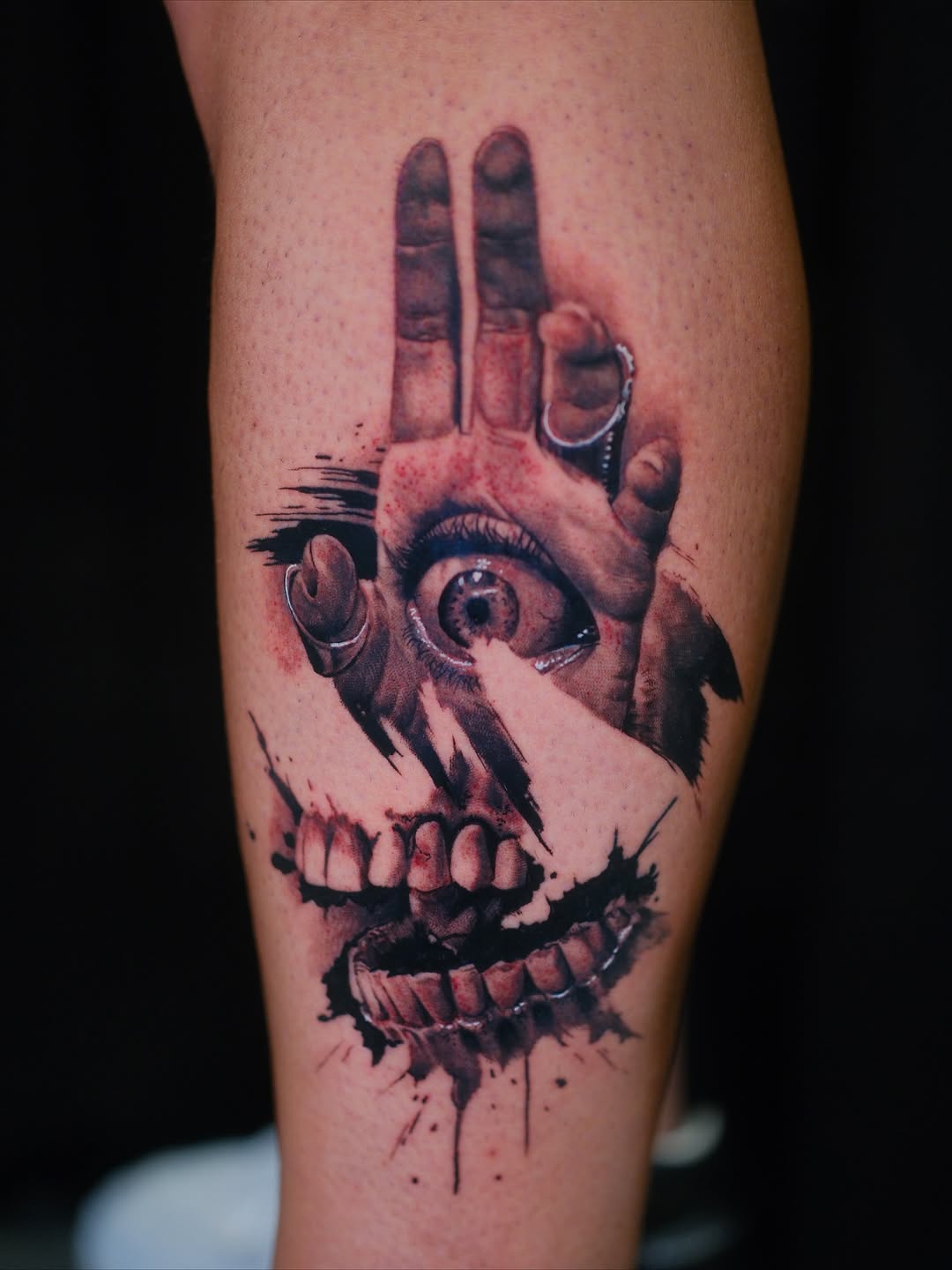 Hand, eye, and teeth surrealism tattoo on the forearm by Joel: Boston Tattoo Artist, Boston, Massachusetts