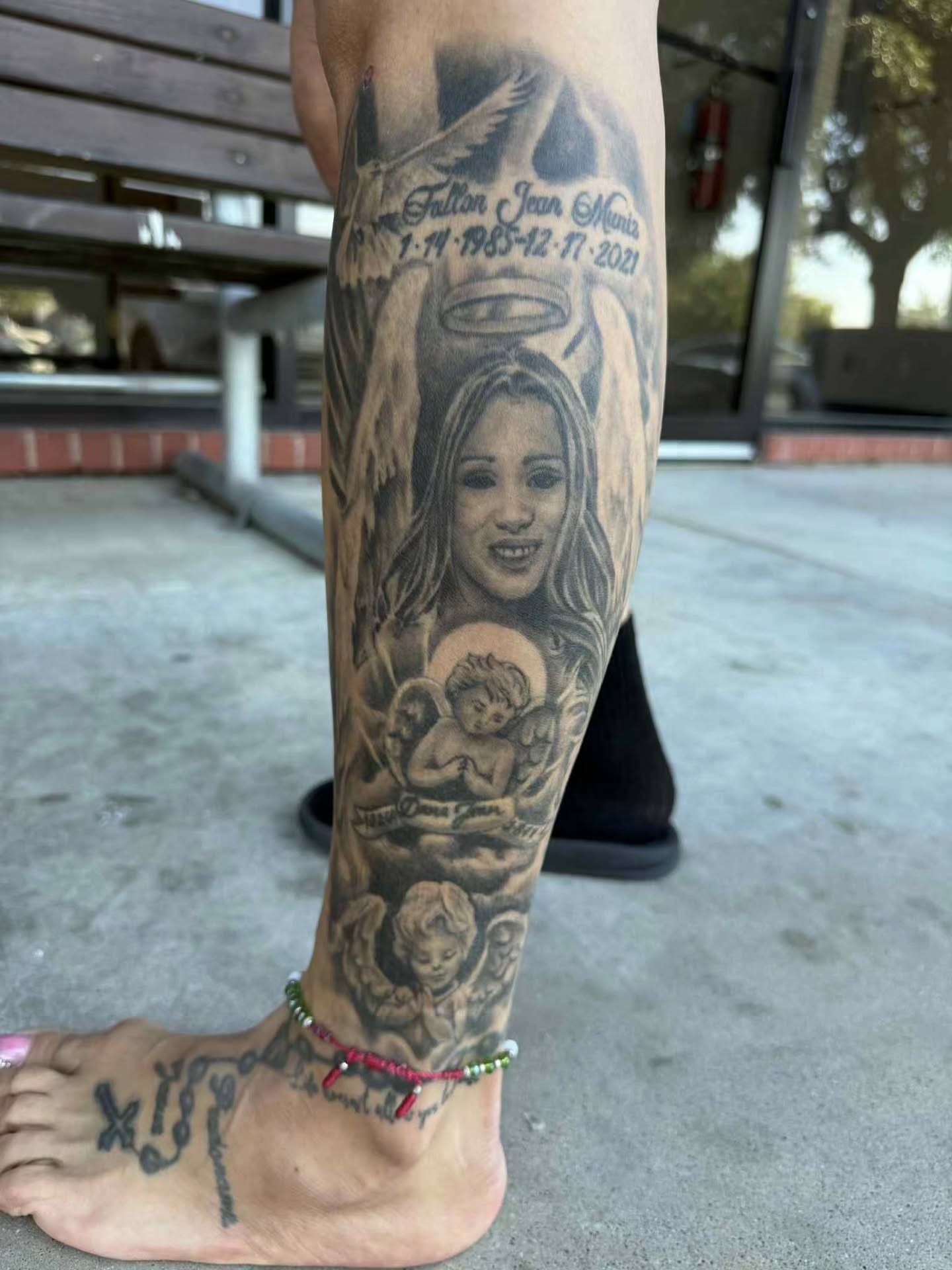 Portrait with cherubs realism tattoo on the calf by Beto Tats, Round Rock, Texas