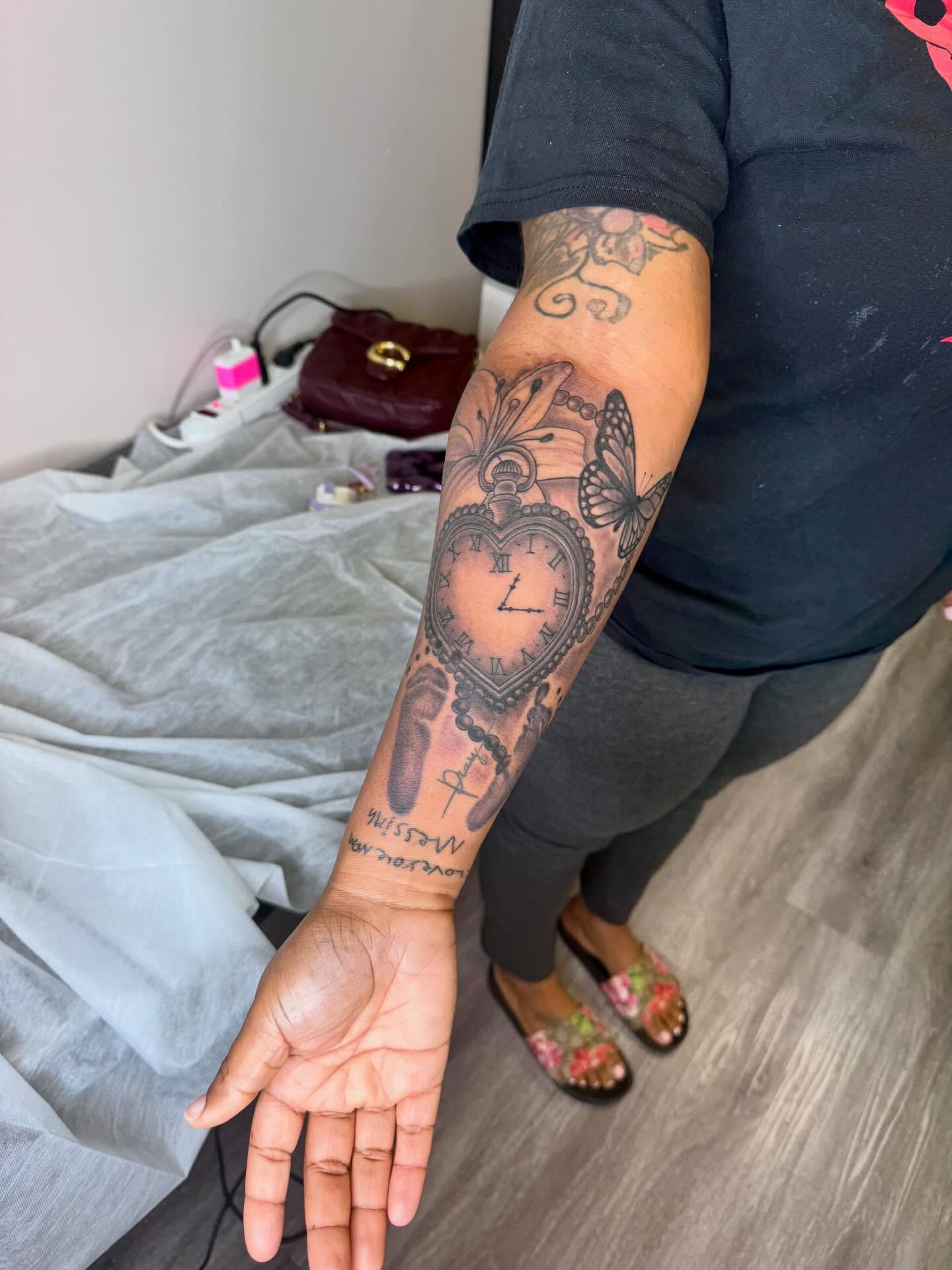 Heart clock geometric tattoo on the forearm by Sierra 🩷