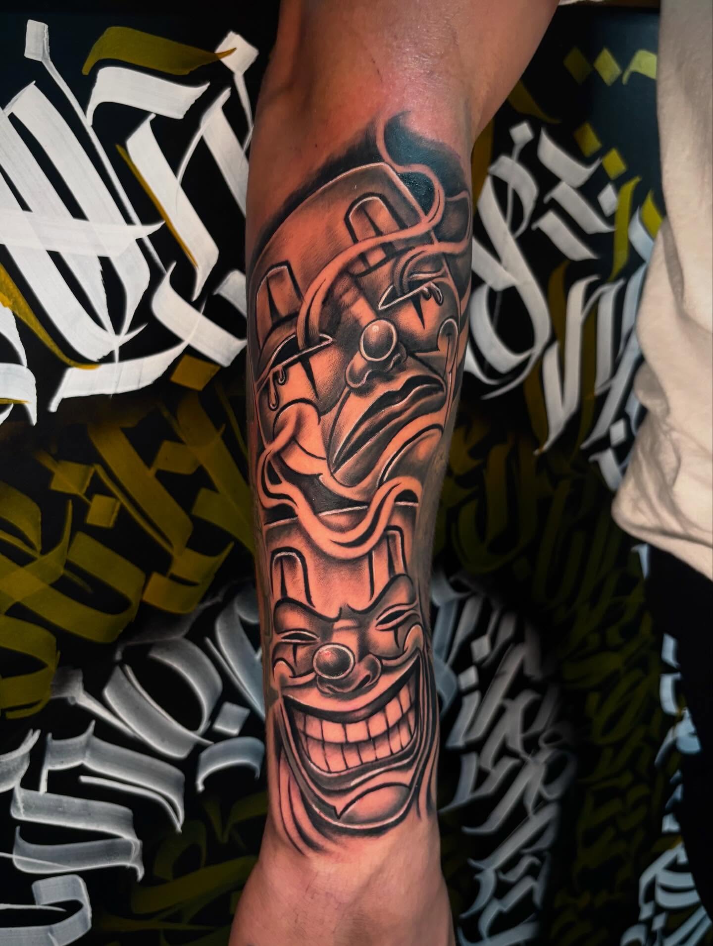 Clown mask realism tattoo on the forearm by Daero Tattoo, New York, New York