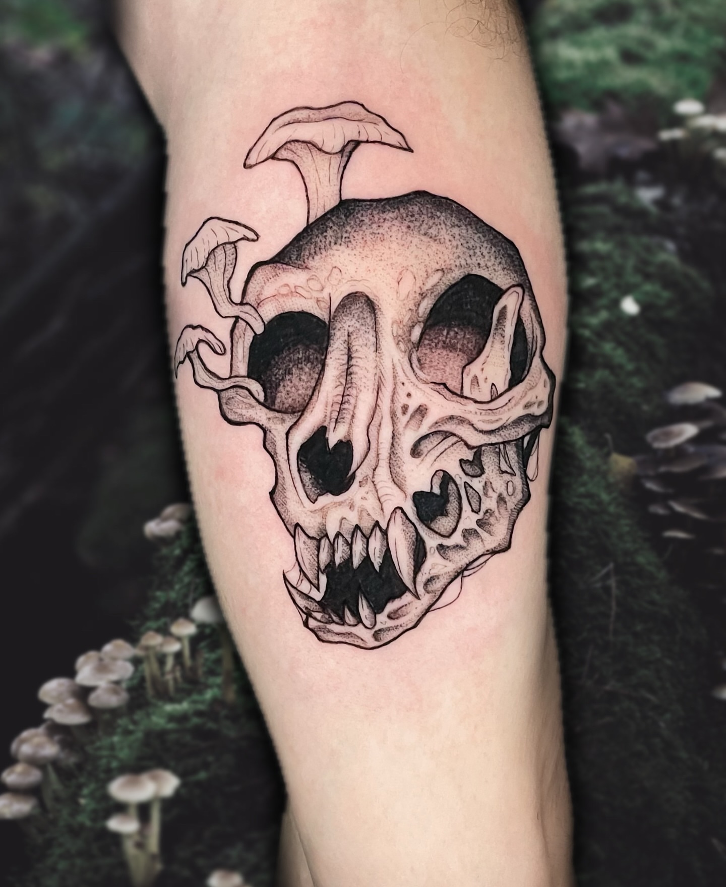 Skull dotwork tattoo on the forearm by Shontel Fowler