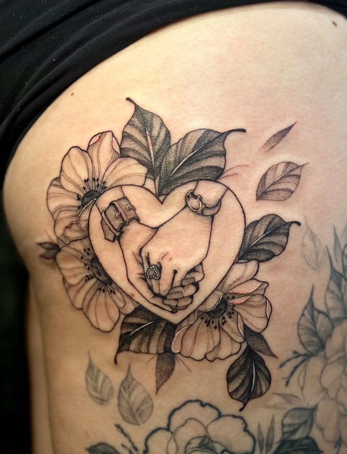 Heart with hands realism tattoo on the thigh by Sabrina, Harrison, New Jersey