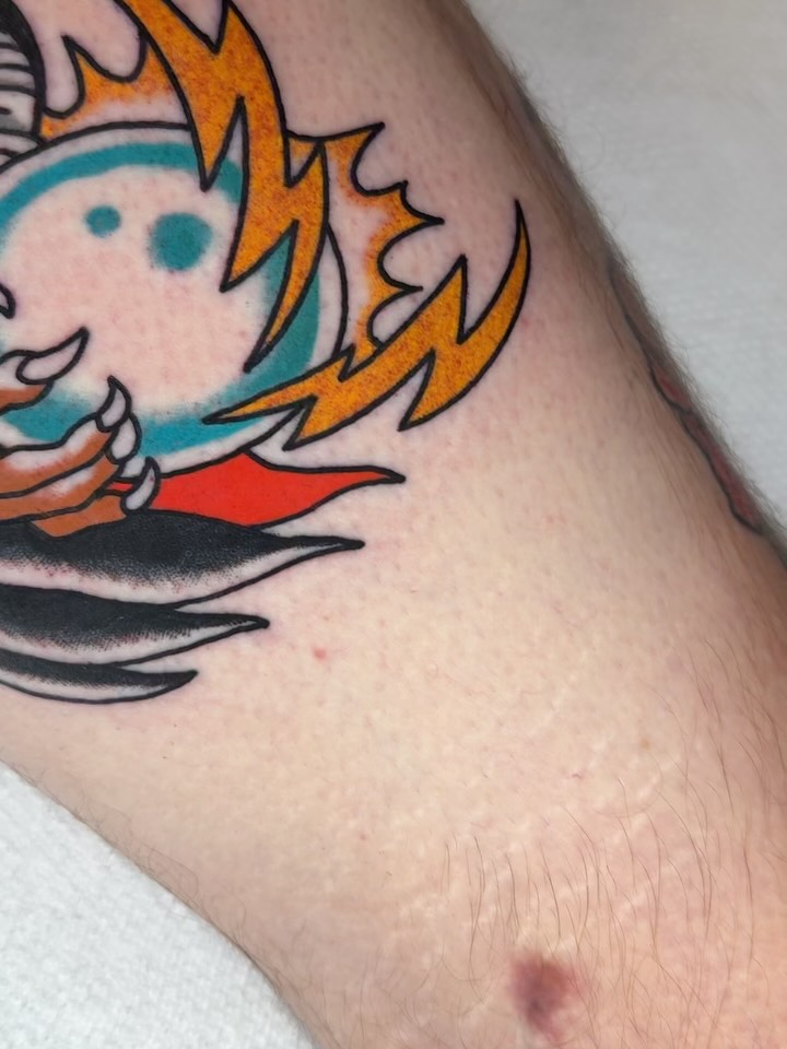 Flaming ghost American traditional tattoo on the forearm by Hayden Combs