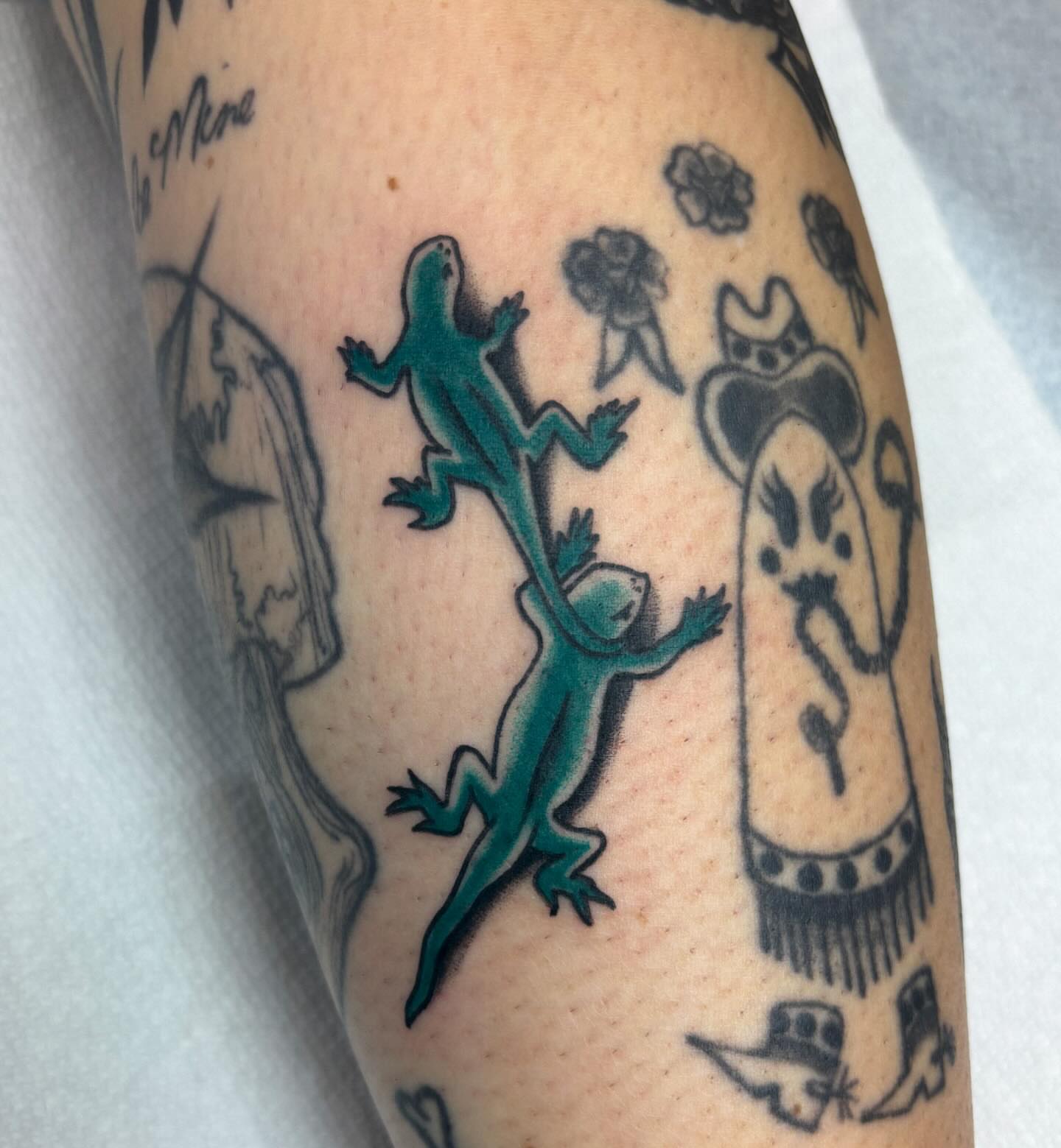 Gecko and child new school tattoo on the forearm by Katelyn Spence