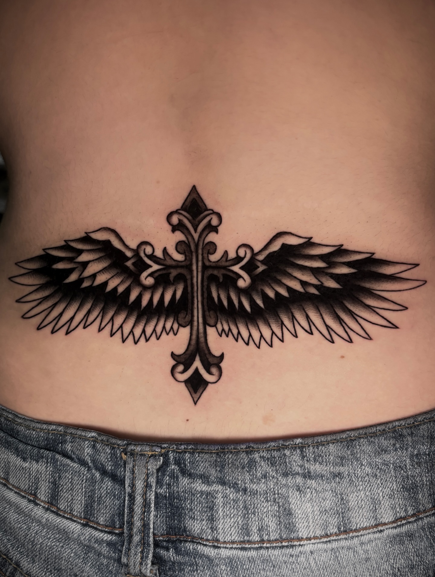 Cross with wings black and grey tattoo on the torso by Matt Elliott, Murfreesboro, Tennessee