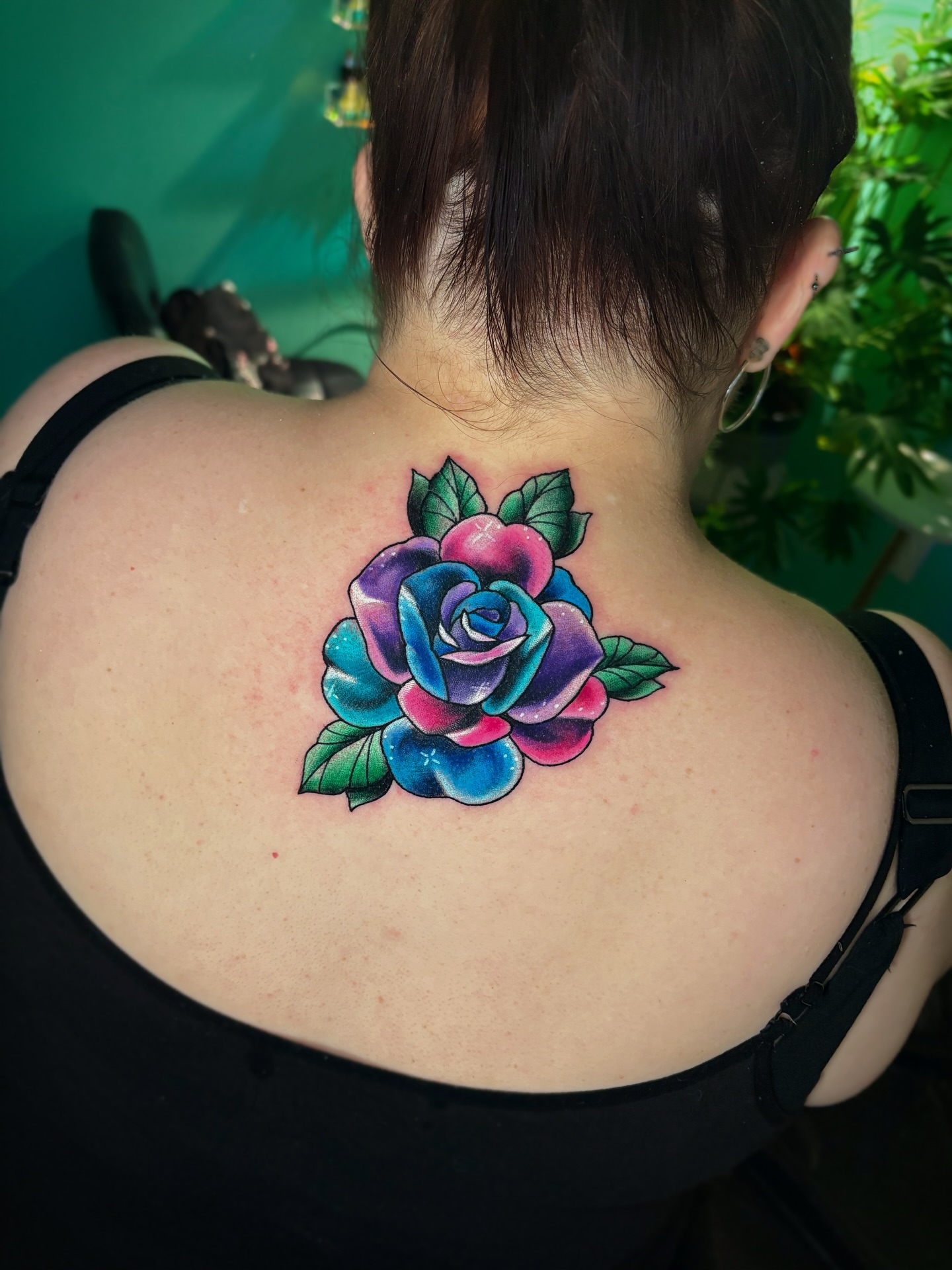 Rose American traditional tattoo on the back by Bunny Noel
