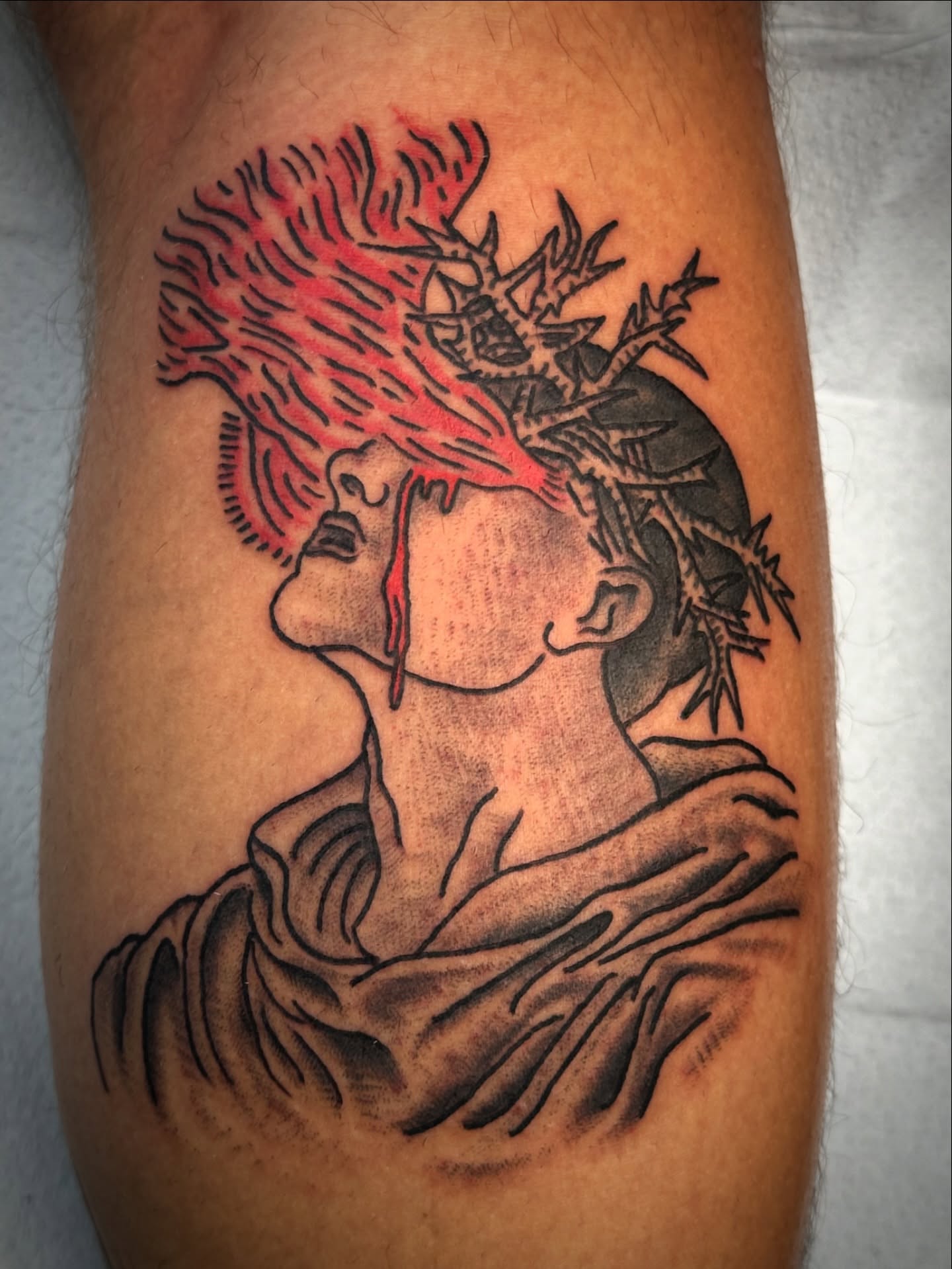 Woman with crown black and grey tattoo on the forearm by Chris Blanchard