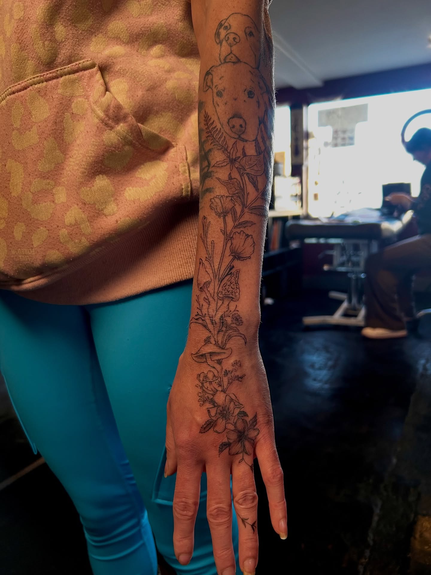 Floral and animal black and grey tattoo on the forearm by King By Trade 👑