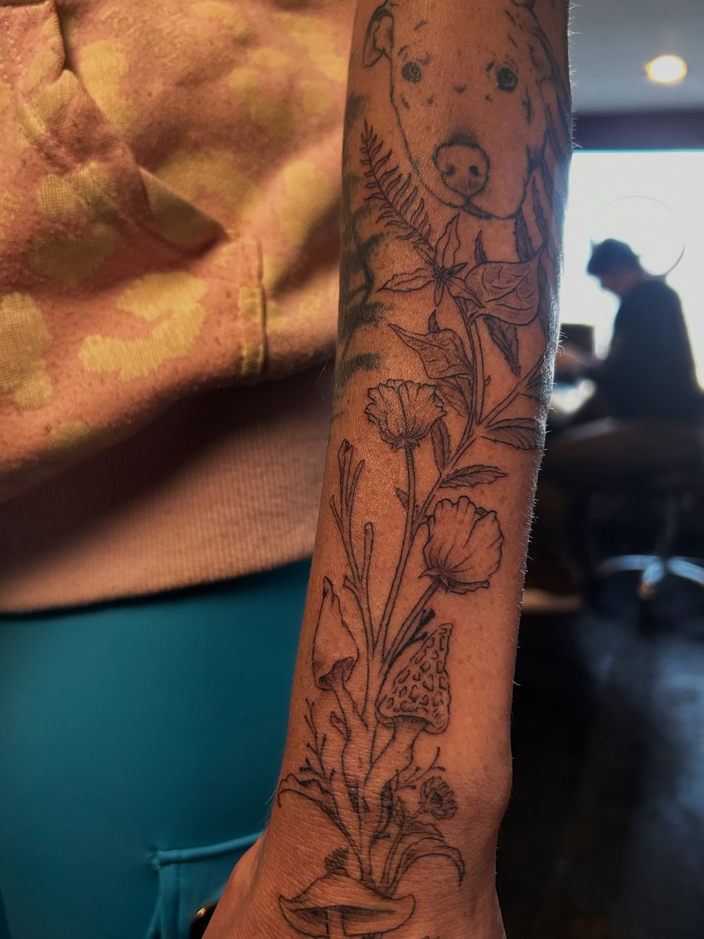 Floral and animal black and grey tattoo on the forearm by King By Trade 👑
