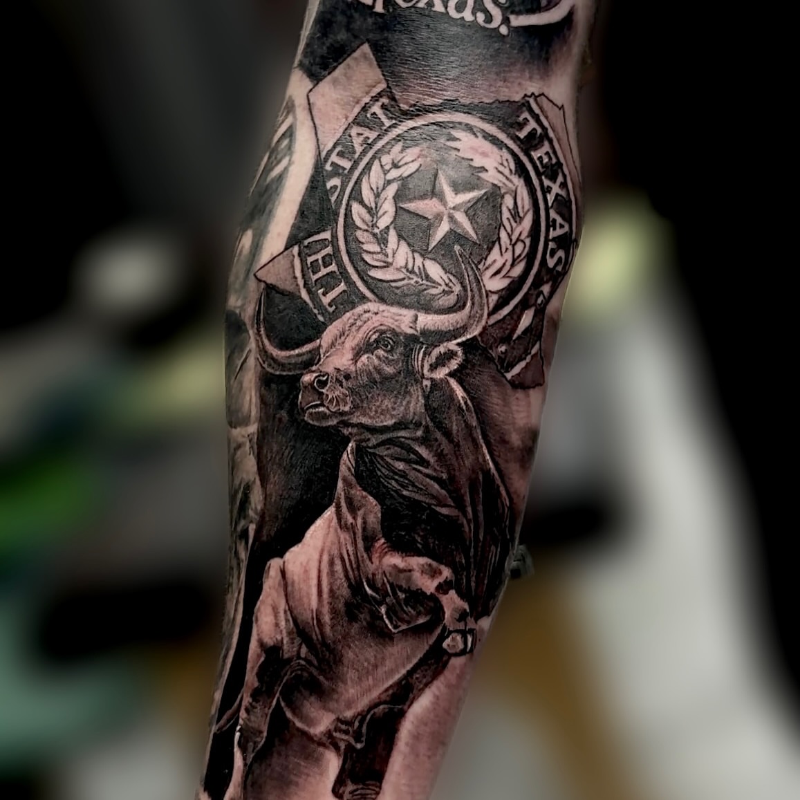 Bull rider realism tattoo on the forearm by Billy Harris