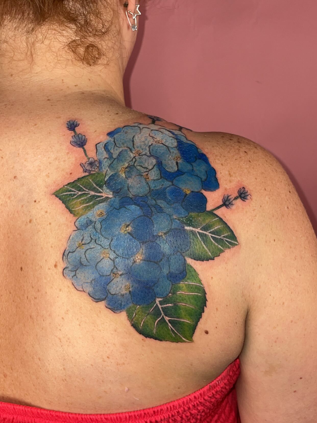 Hydrangea realism tattoo on the shoulder by Natalie