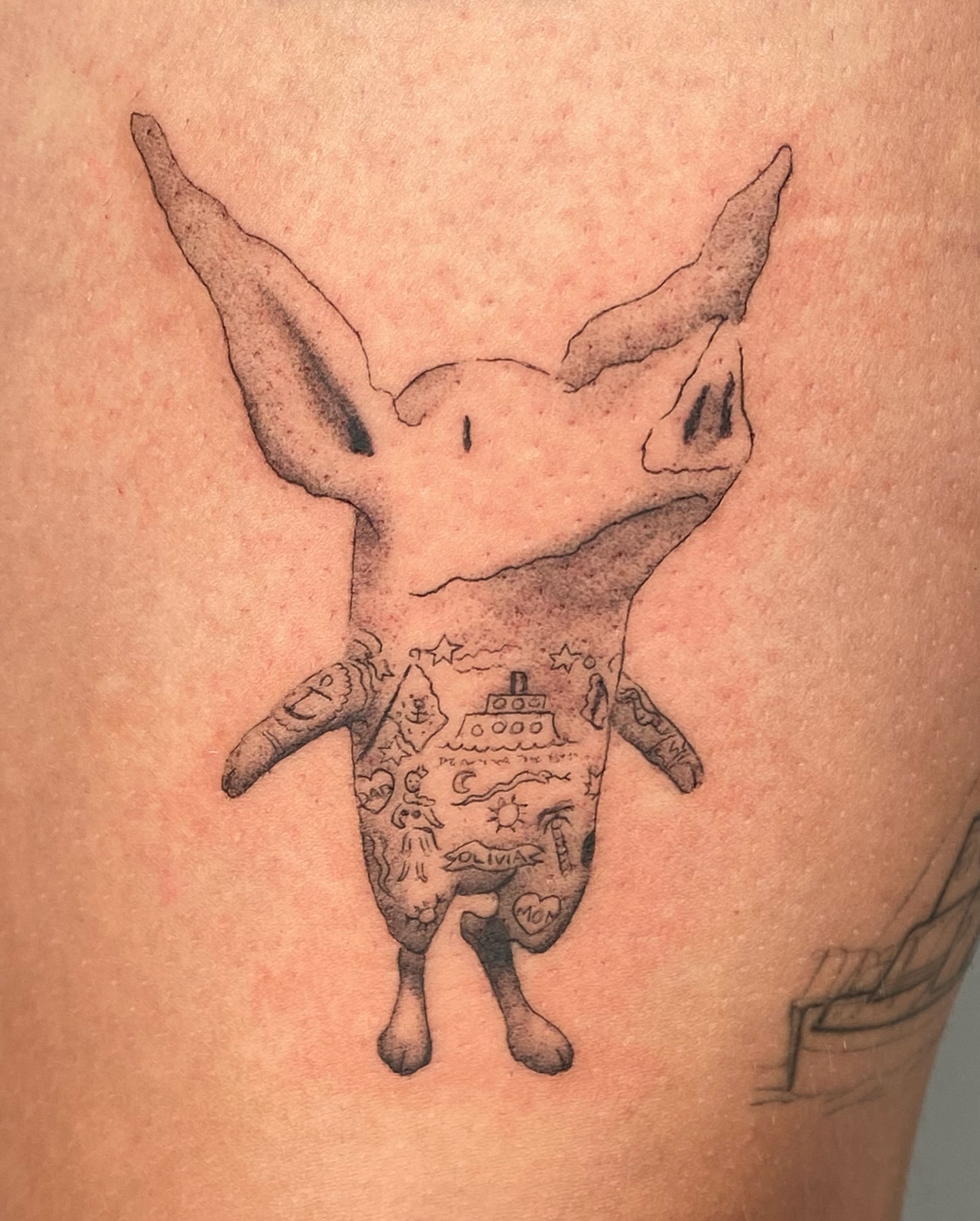 Pig black and grey tattoo on the thigh by Olivia