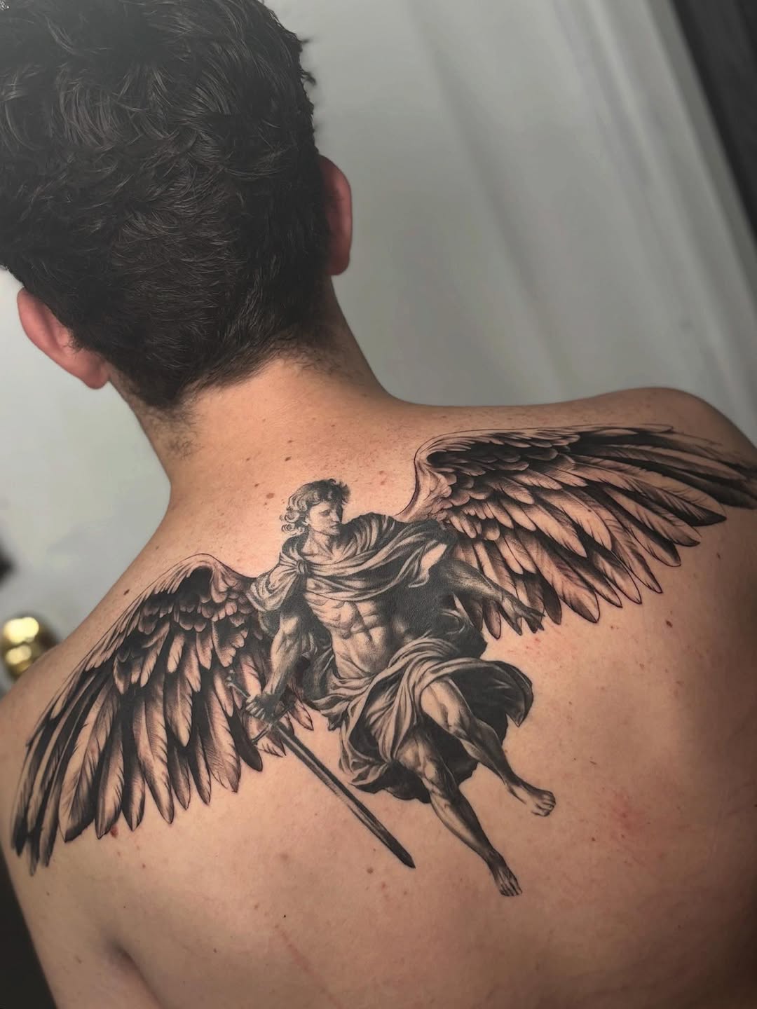 Angel with sword realism tattoo on the back by Tattoos by Tessa