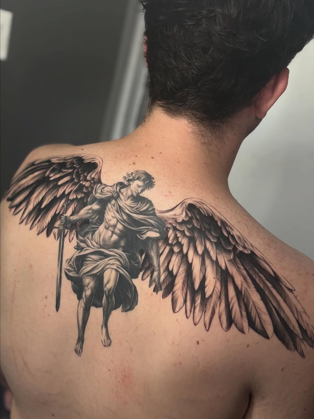 Angel with sword realism tattoo on the back by Tattoos by Tessa