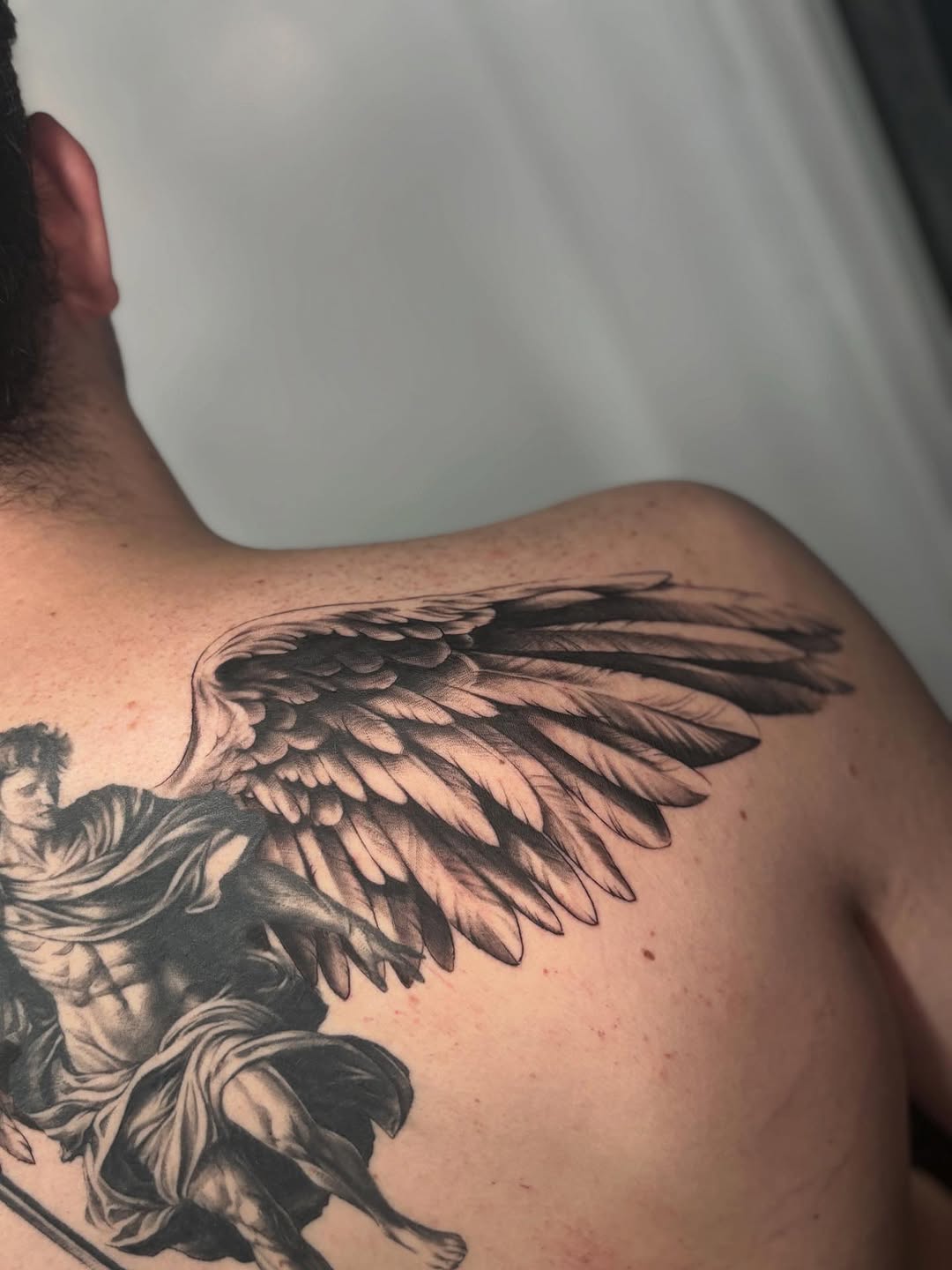 Angel with wings realism tattoo on the shoulder by Tattoos by Tessa