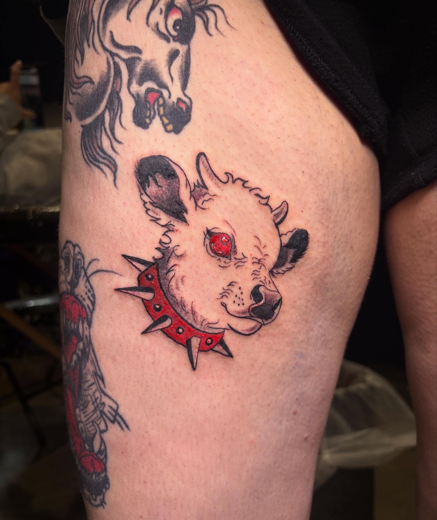 Bull American traditional tattoo on the thigh by Shampooh