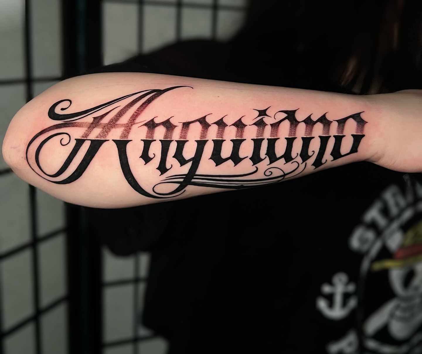 Script lettering lettering script tattoo on the forearm by Tattoo Artist
