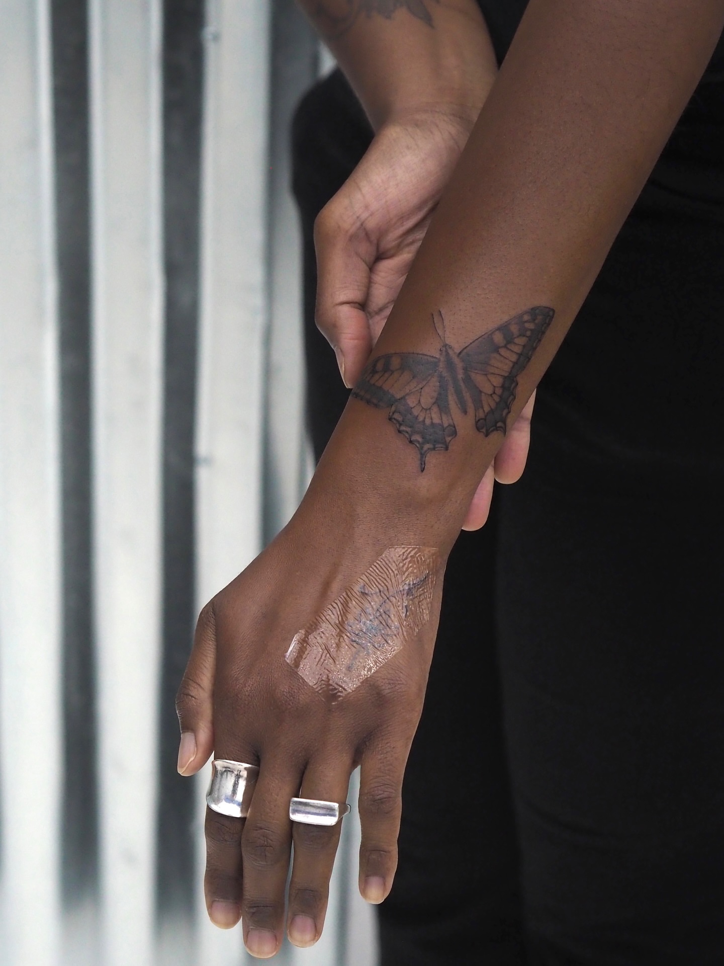 Butterfly black and grey tattoo on the forearm by Anastasiia Pakhanova ♥ tattoo artist
