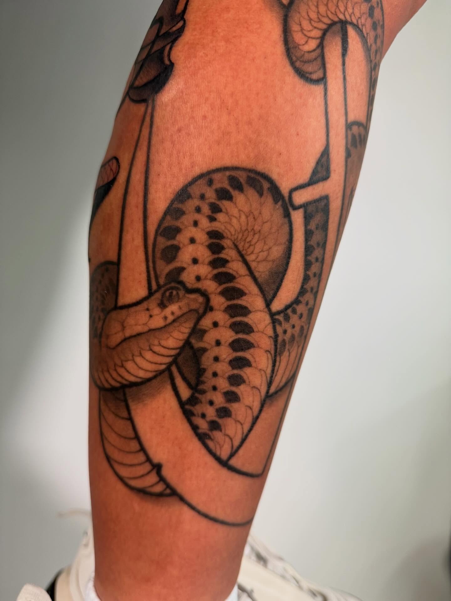 Snake black and grey tattoo on the forearm by ✖️mike Alan✖️