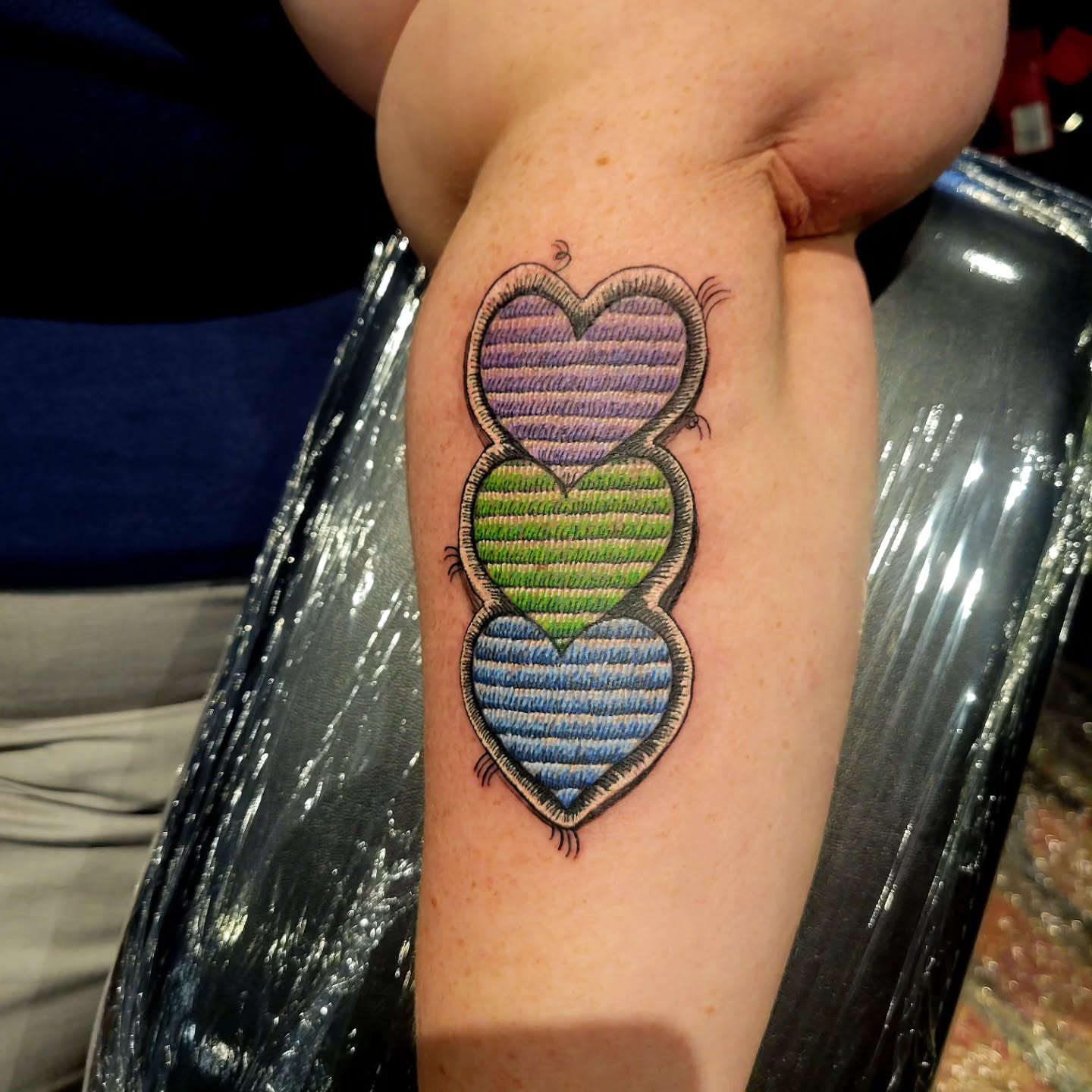 Striped hearts dotwork tattoo on the forearm by Naez Ink AKA Renae Madison, Macomb, Illinois