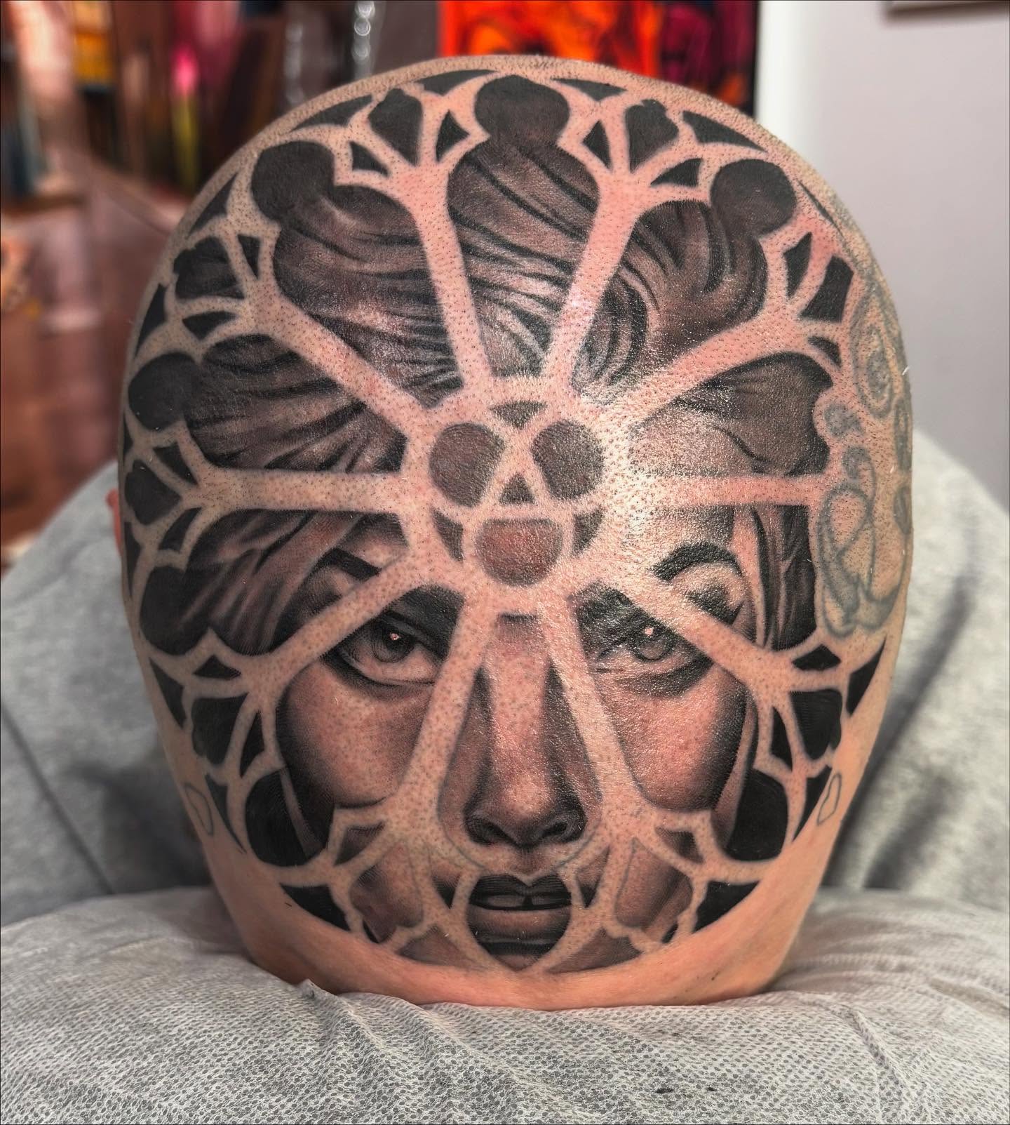 Geometric face geometric tattoo on the head by Mike Doherty, Abington, Massachusetts