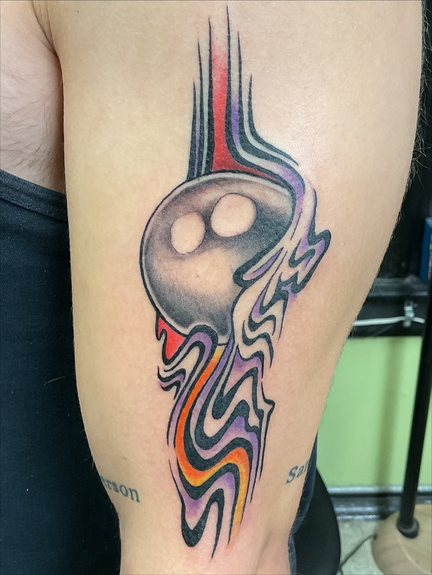 Bowling ball with flames new school tattoo on the thigh by Roachrude