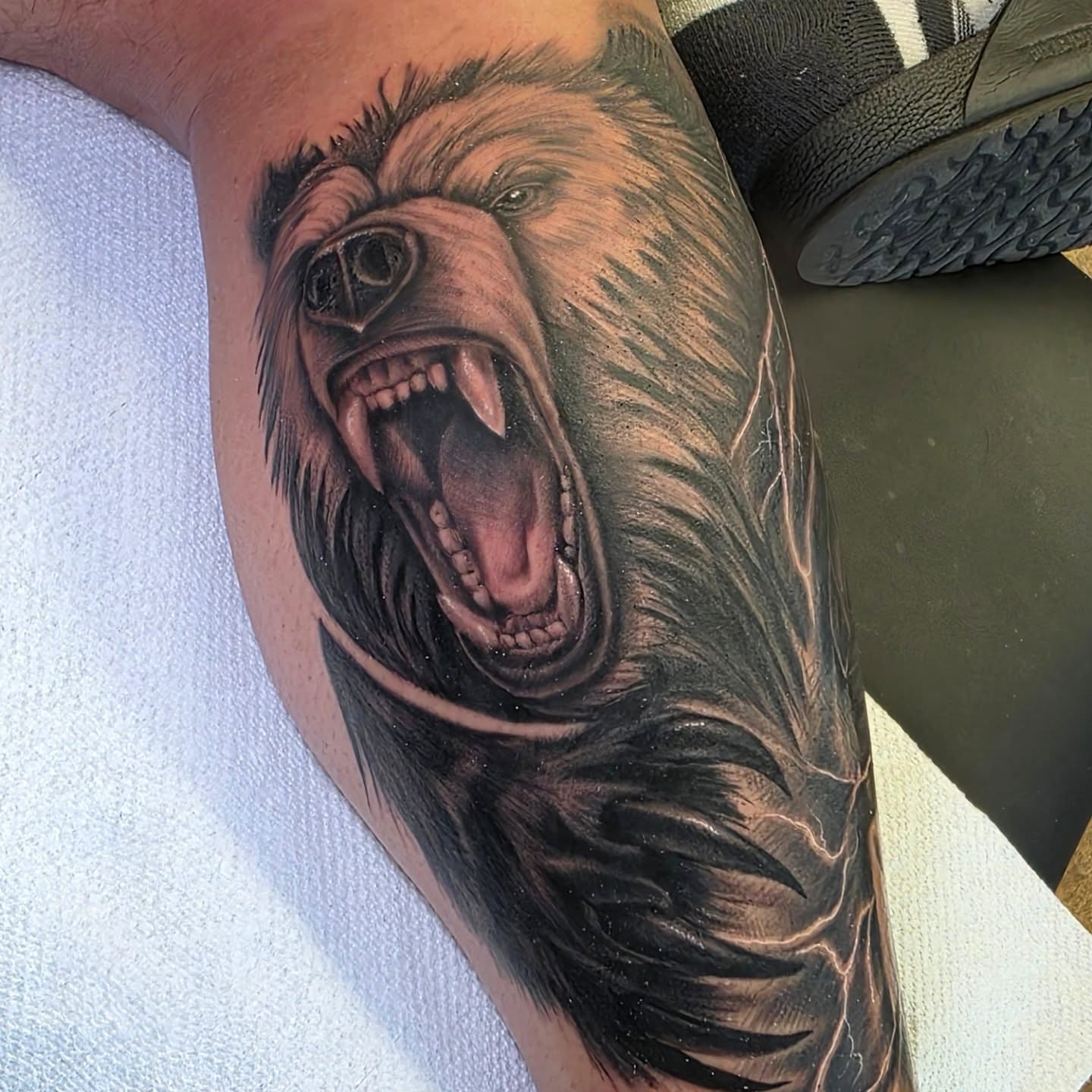 Bear realism tattoo on the forearm by BZ Artistry