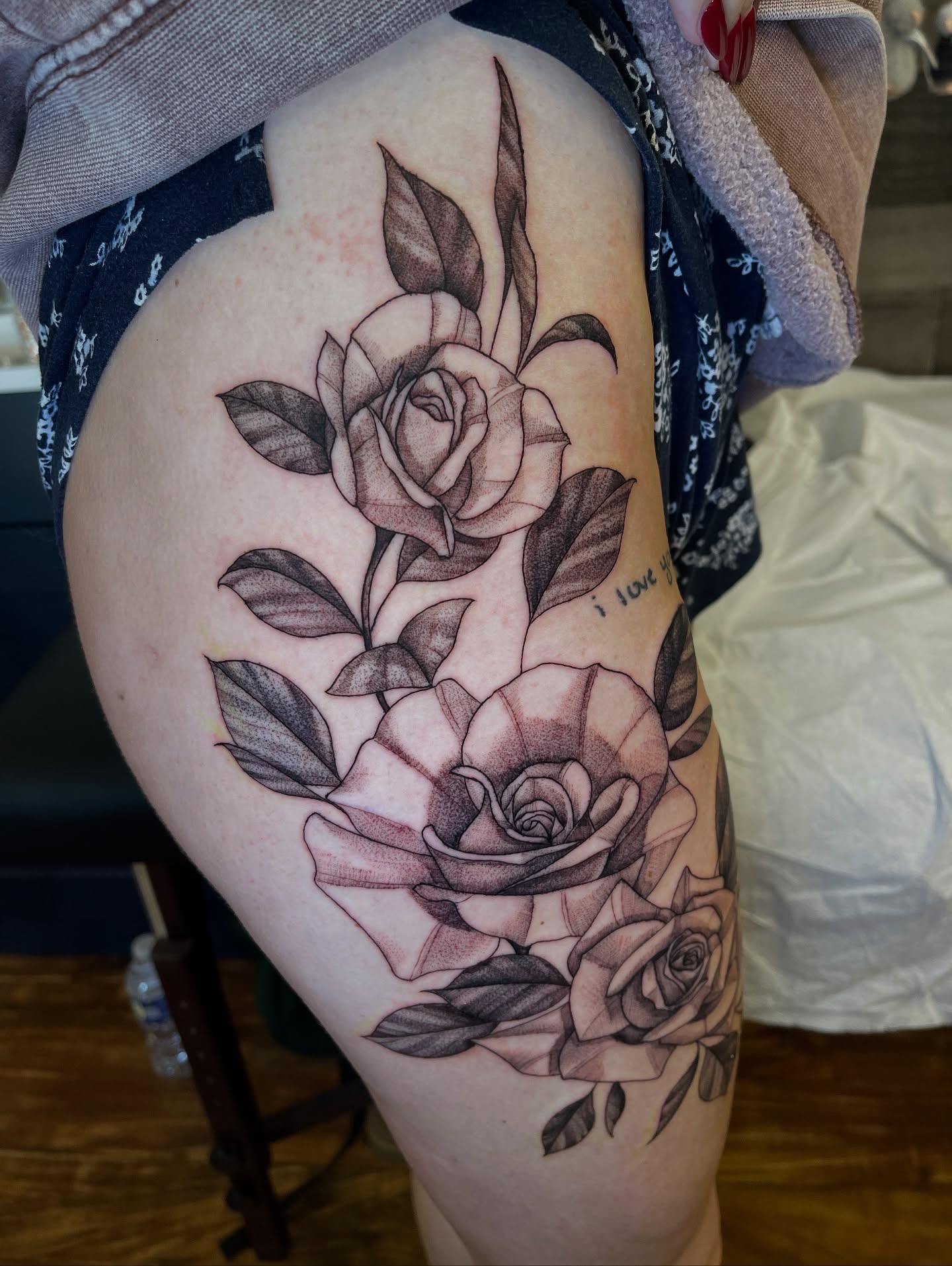 Roses black and grey tattoo on the thigh by Blake Alan Tattoos (TROUT)