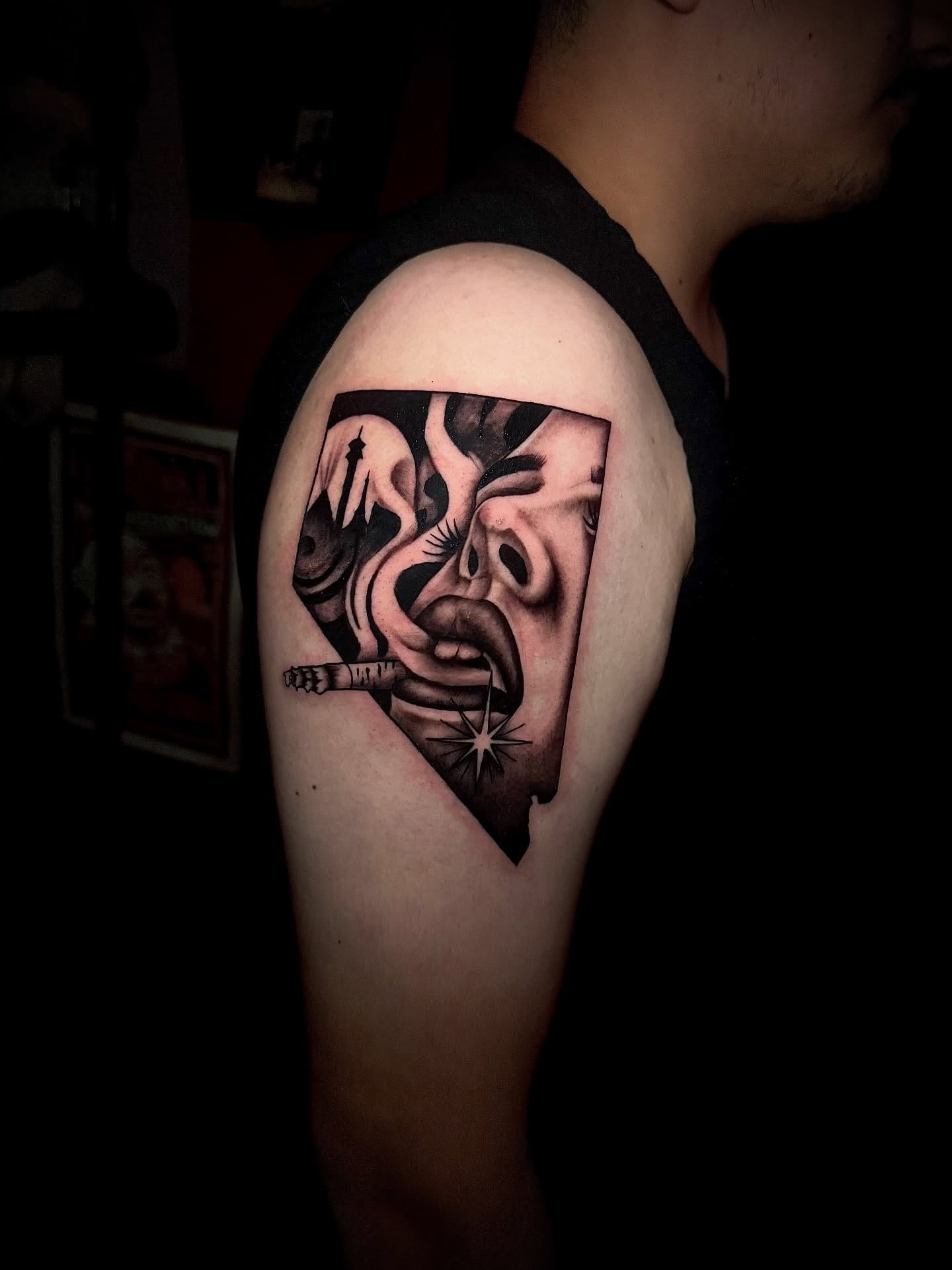 Abstract face geometric tattoo on the shoulder by Ryland - Tattoo Artist
