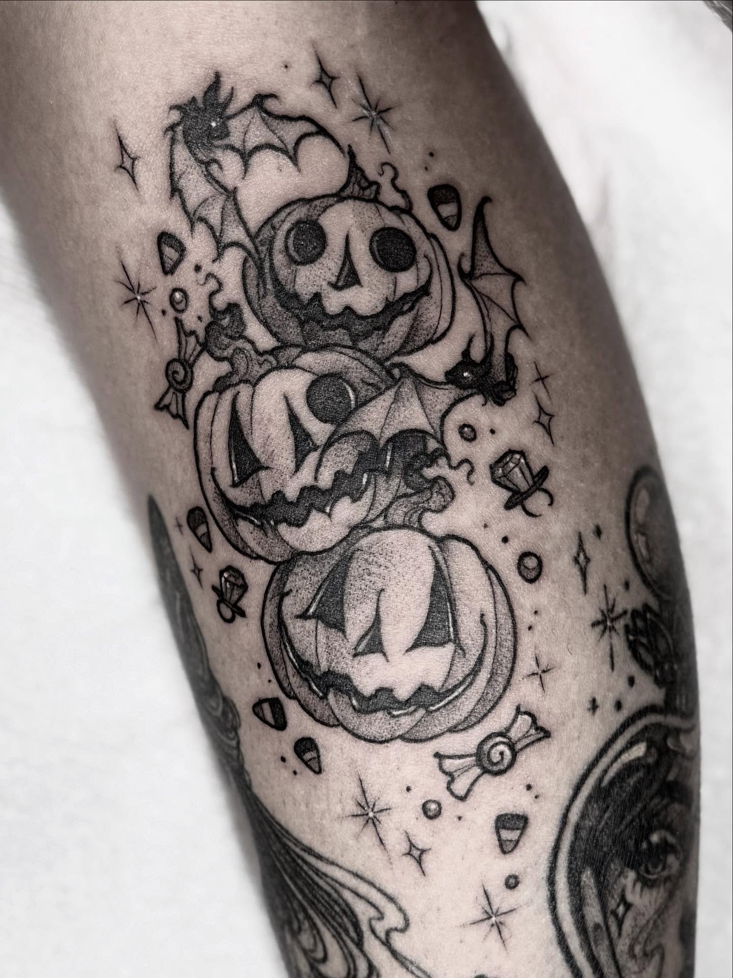 Pumpkins black and grey tattoo on the forearm by Cincinnati