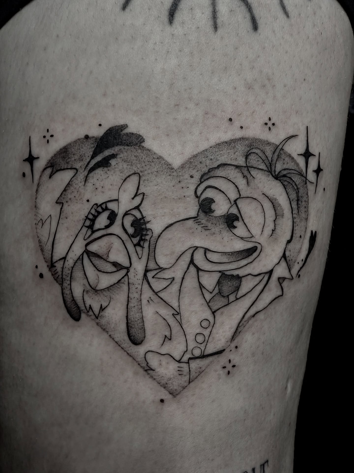 Clowns in heart dotwork tattoo on the forearm by Jynx