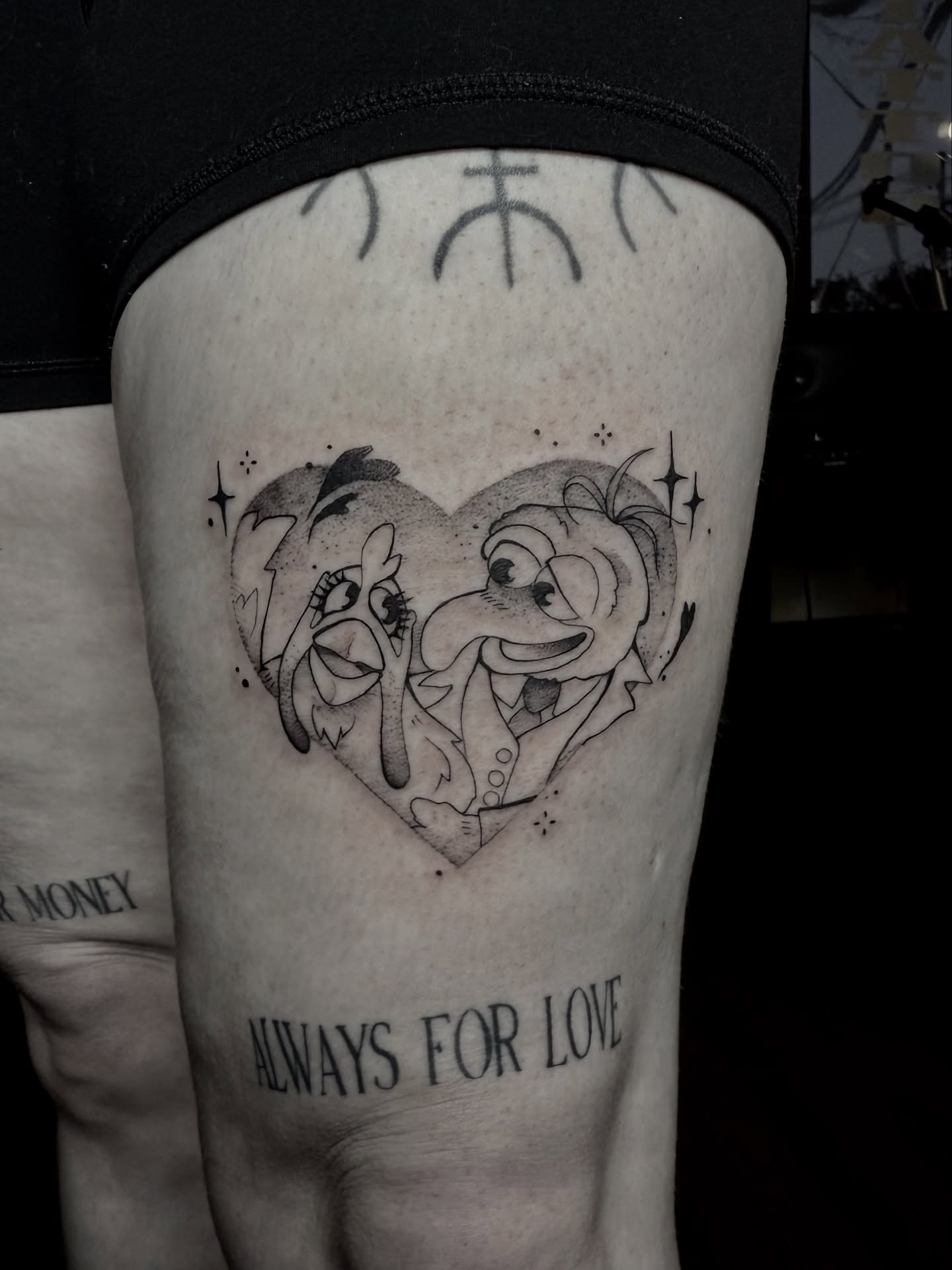 Love couple black and grey tattoo on the forearm by Jynx