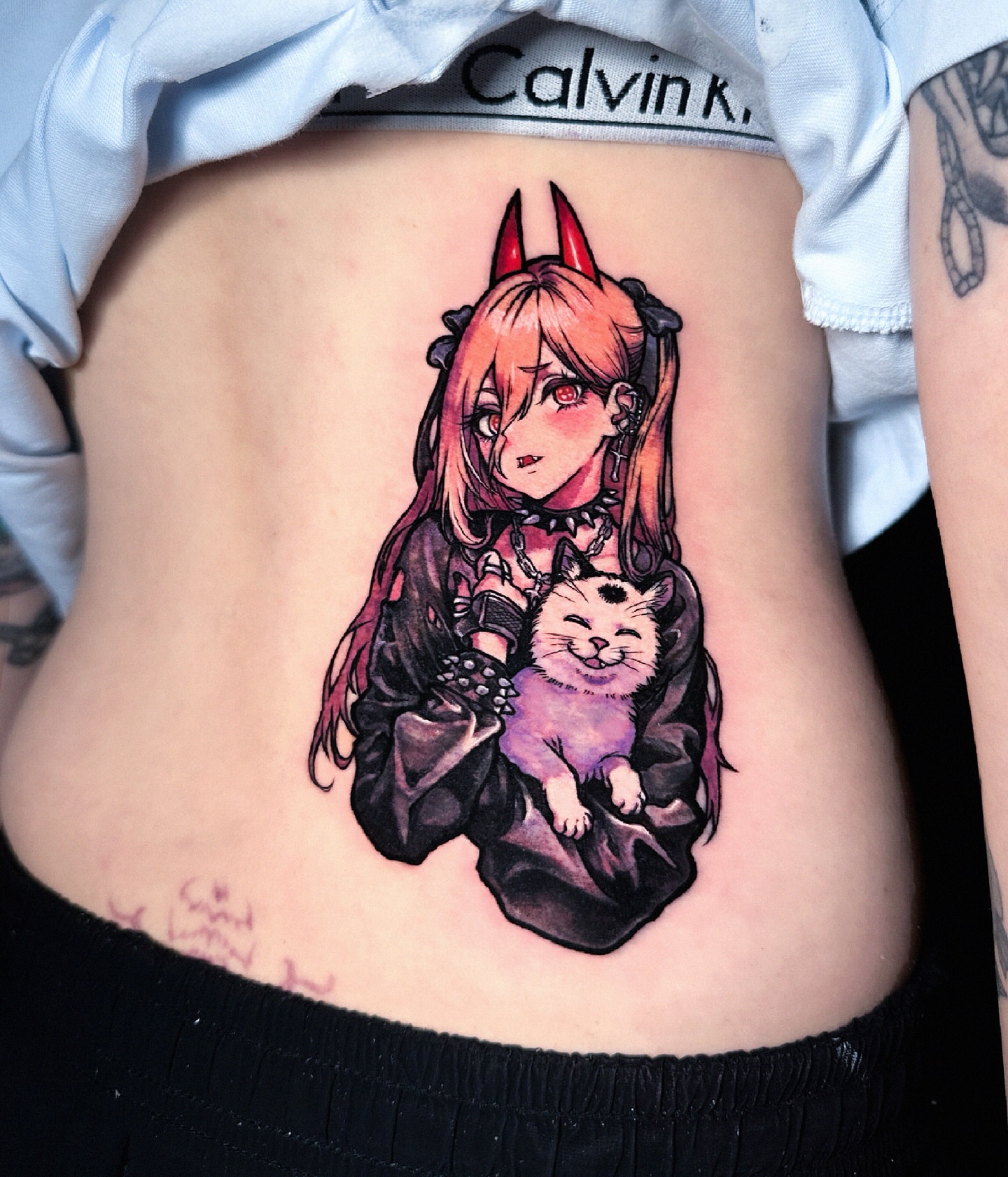 Anime girl with cat anime tattoo on the ribs by Sed