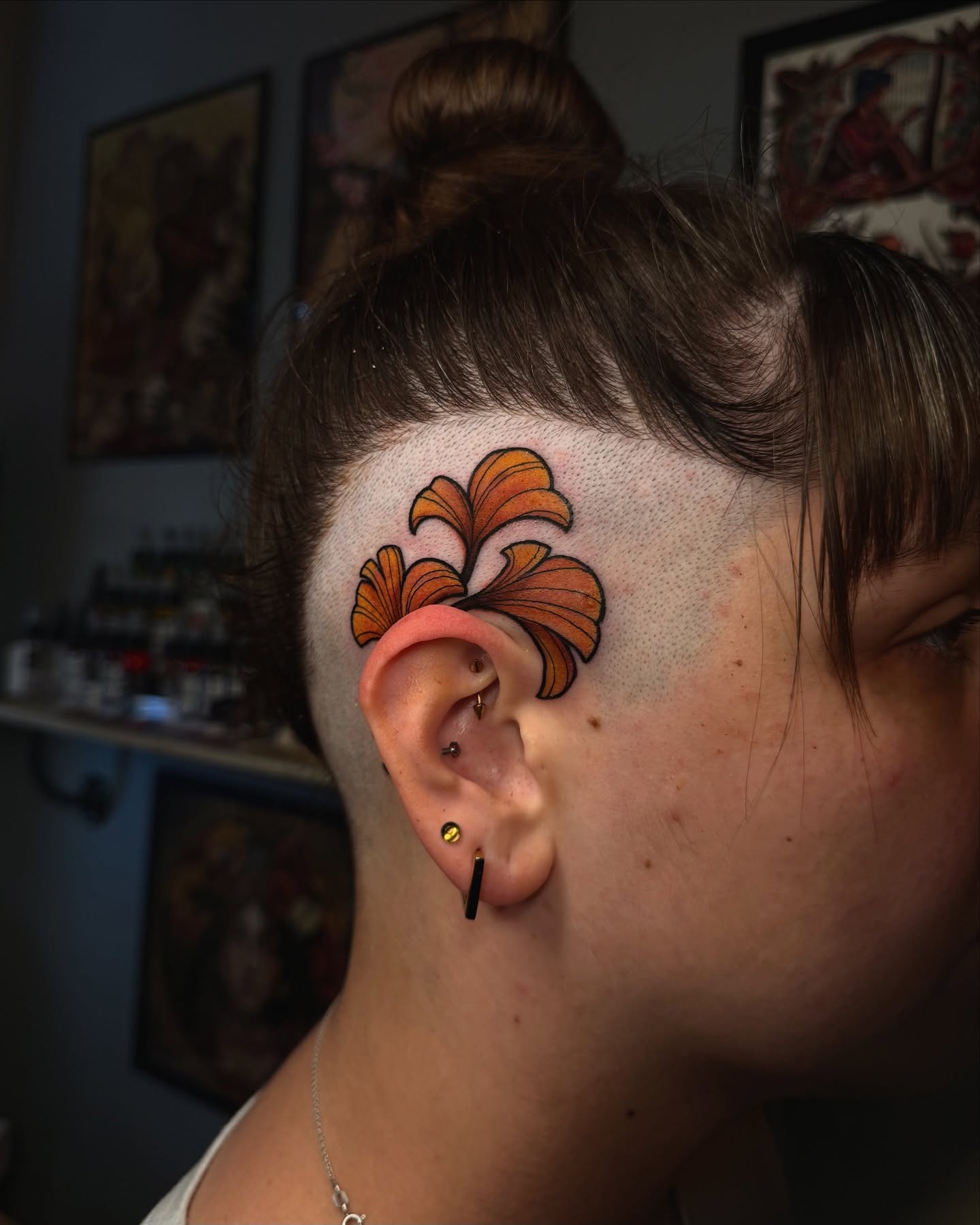 Flower American traditional tattoo on the head by laura baldwin