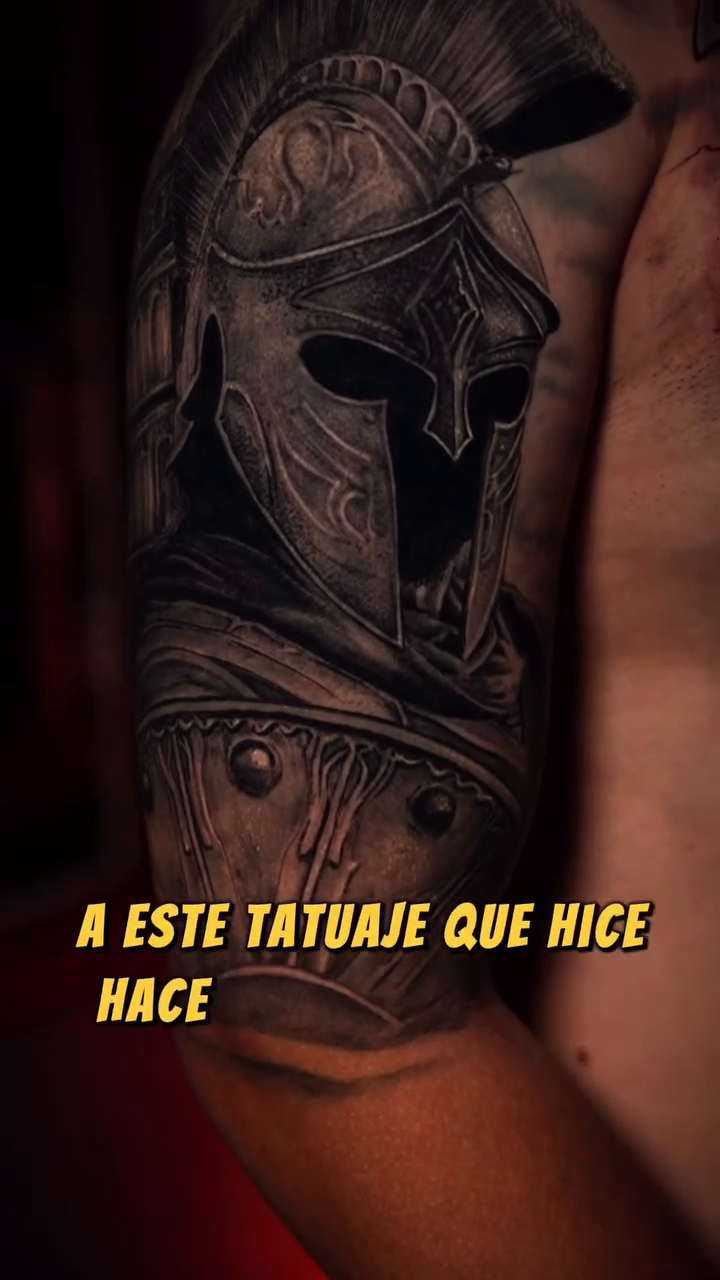 Spartan helmet realism tattoo by Adrian Gonzalez