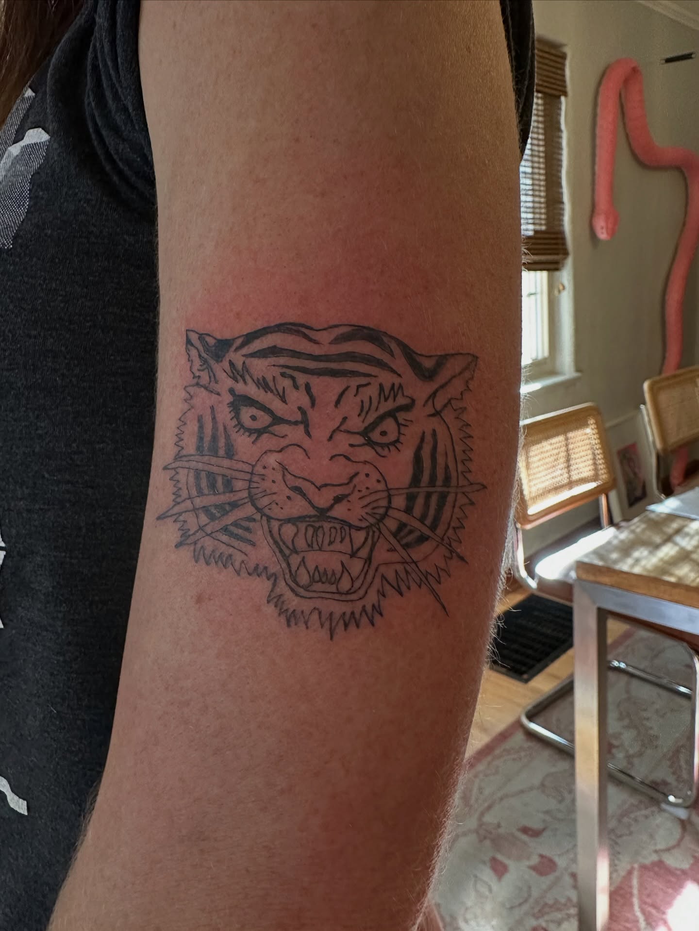 Tiger black and grey tattoo on the forearm by Matt Tripodi