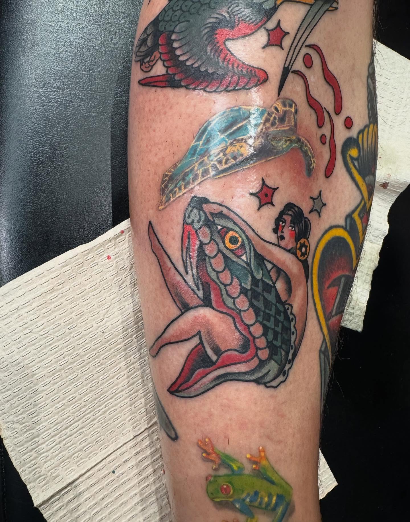 Mermaid and fish American traditional tattoo on the forearm by Joe Khay, Hackettstown, New Jersey