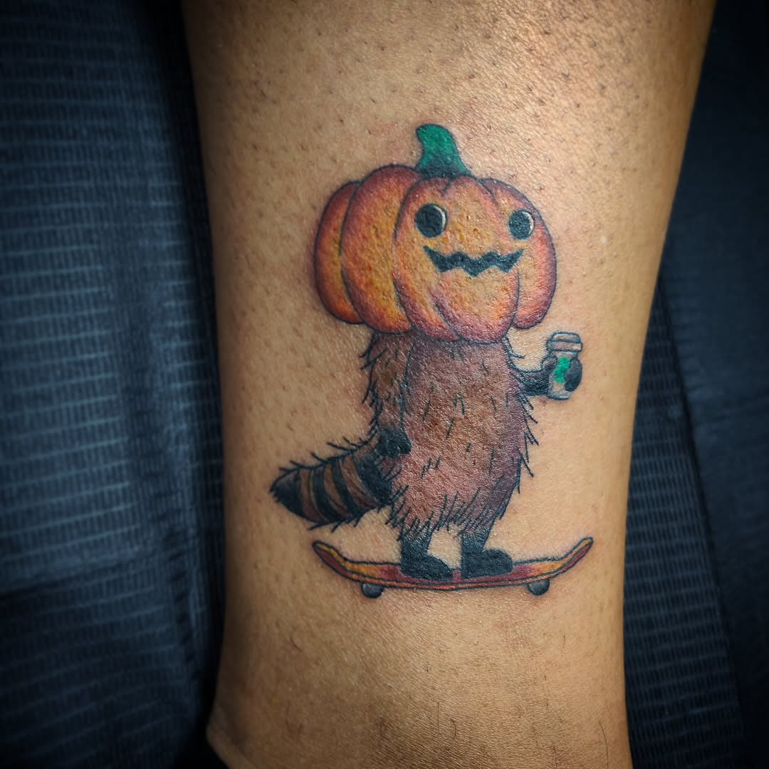 Pumpkin character dotwork tattoo on the forearm by Julie MacDonald