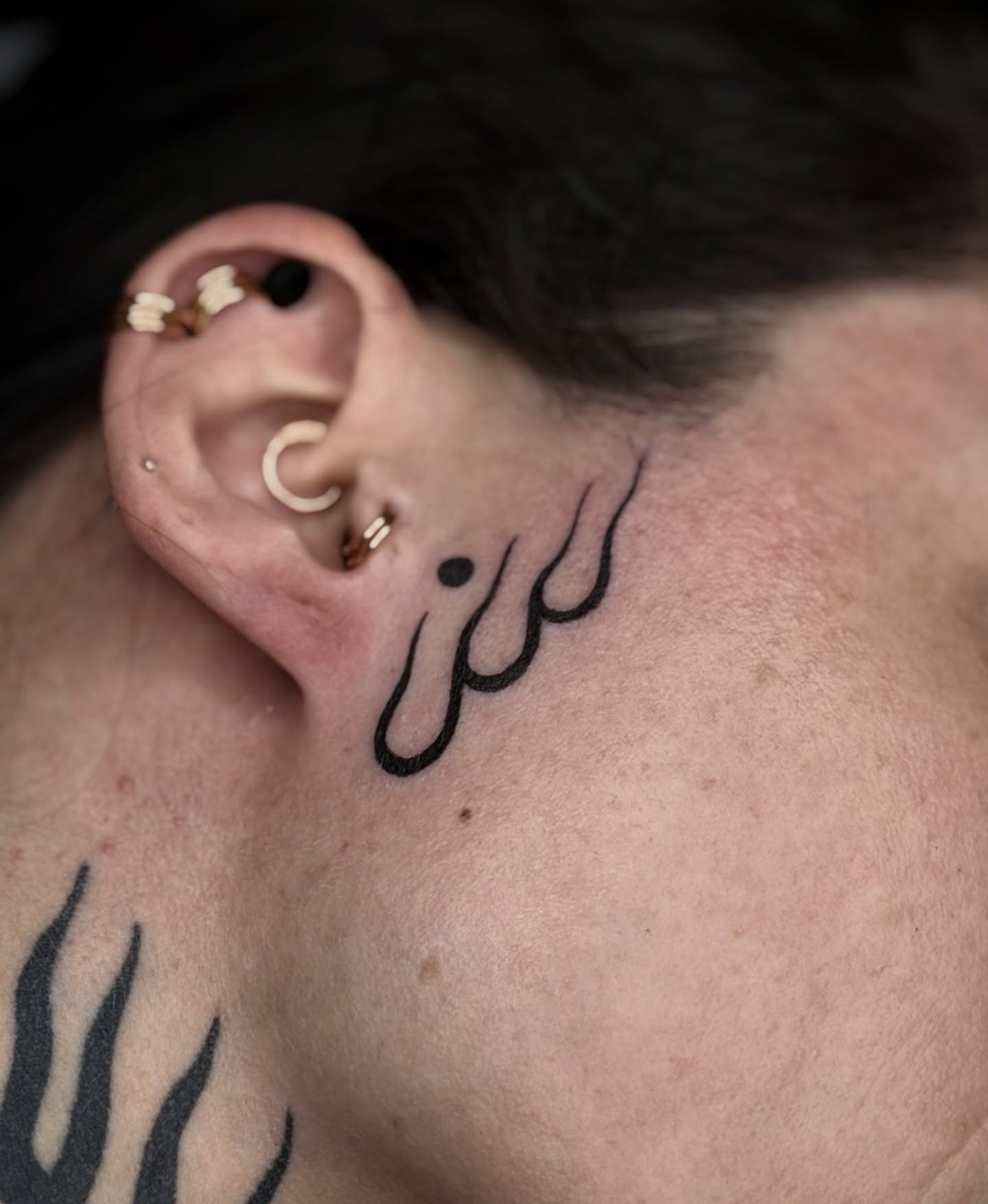Flame black and grey tattoo on the neck by Maks
