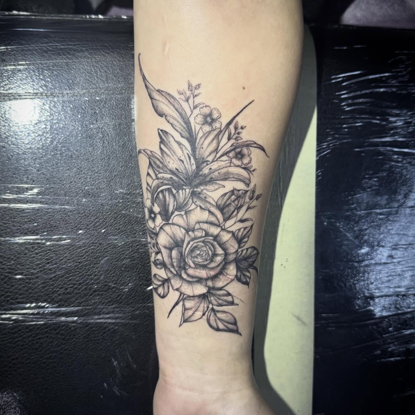 Floral arrangement realism tattoo on the forearm by AaronAdlerTattoos.com, Cincinnati