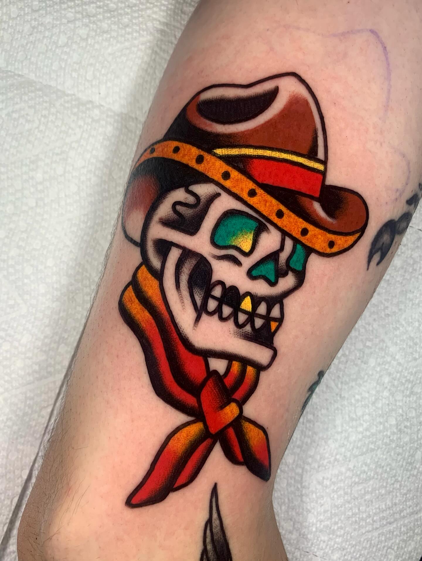 Skull wearing cowboy hat American traditional tattoo on the forearm by Shawn VanKirk