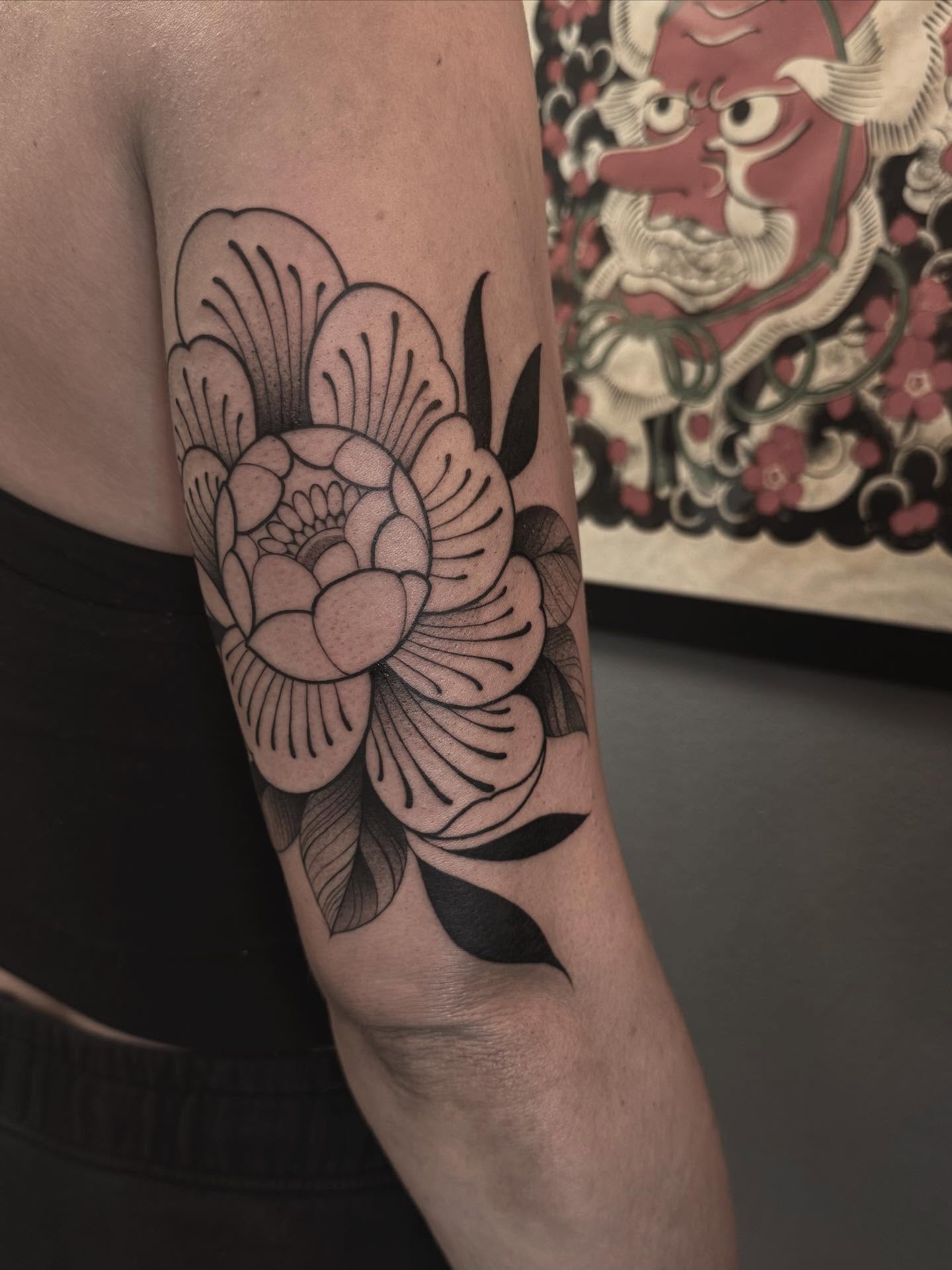 Peony flower black and grey tattoo on the forearm by ᴋᴀᴛᴇ ᯽ ᴘᴀᴄɪᴏᴛᴛɪ