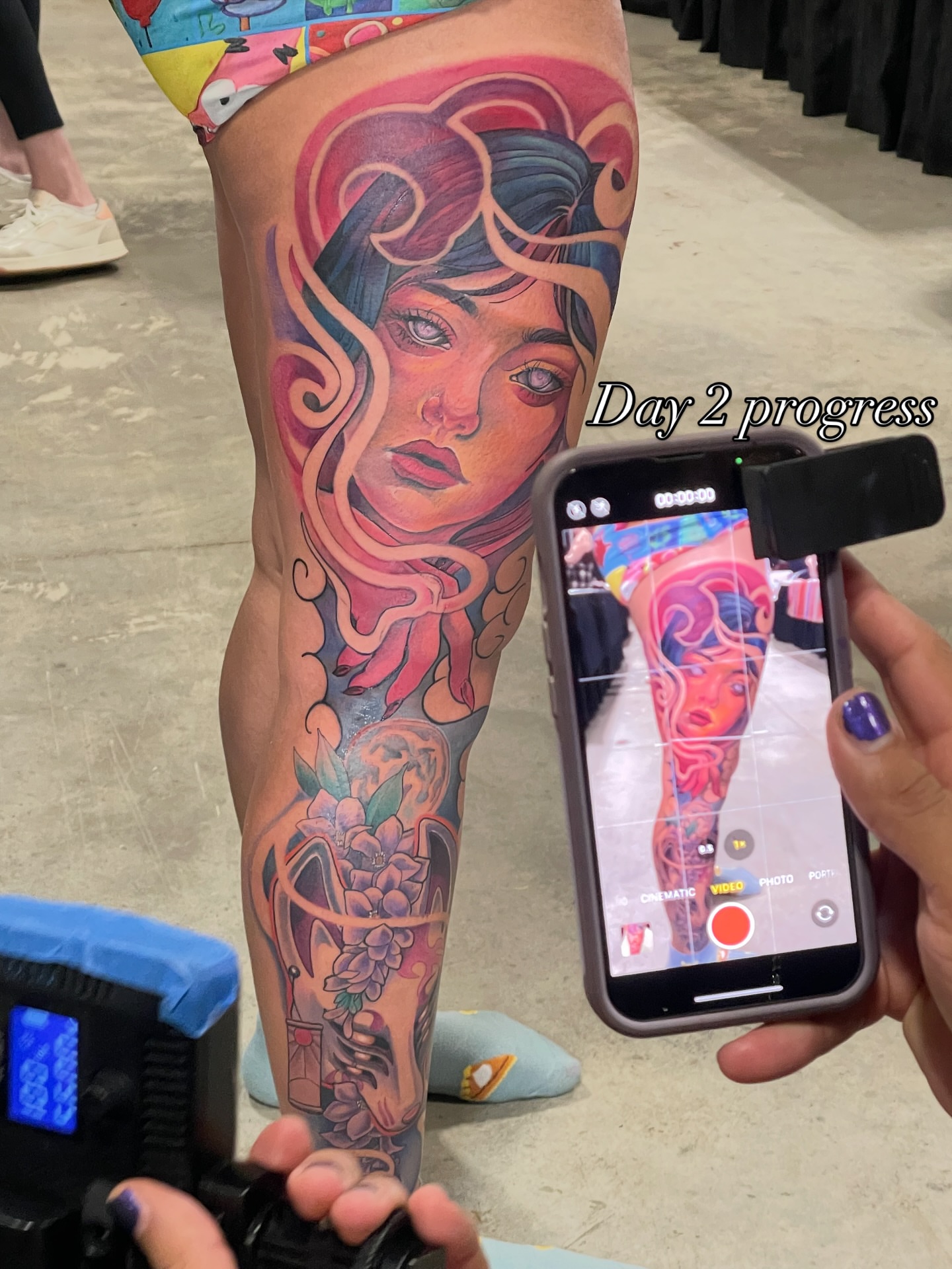 Woman's face realism tattoo on the thigh by Mando Castro