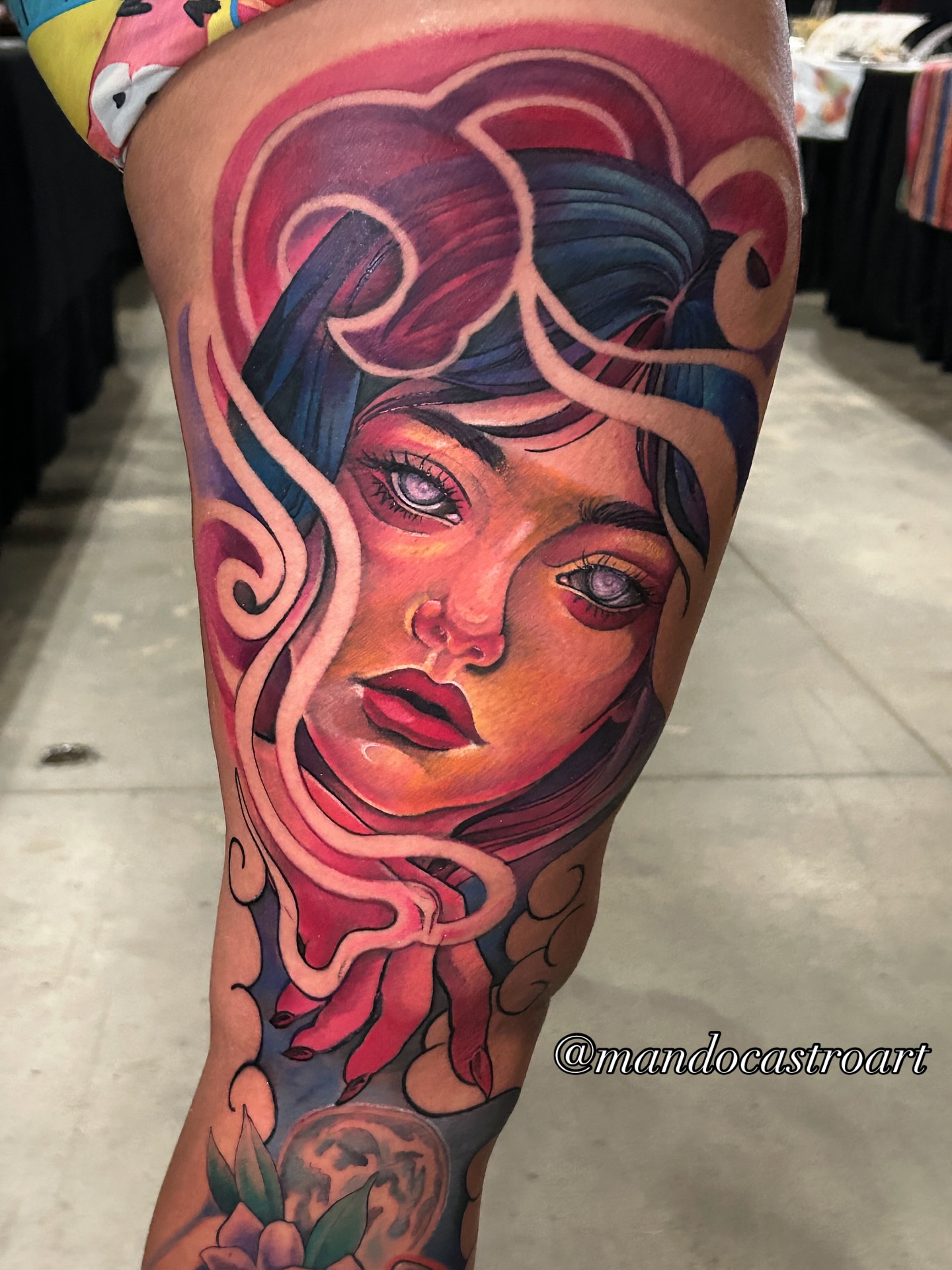 Woman's face realism tattoo on the forearm by Mando Castro